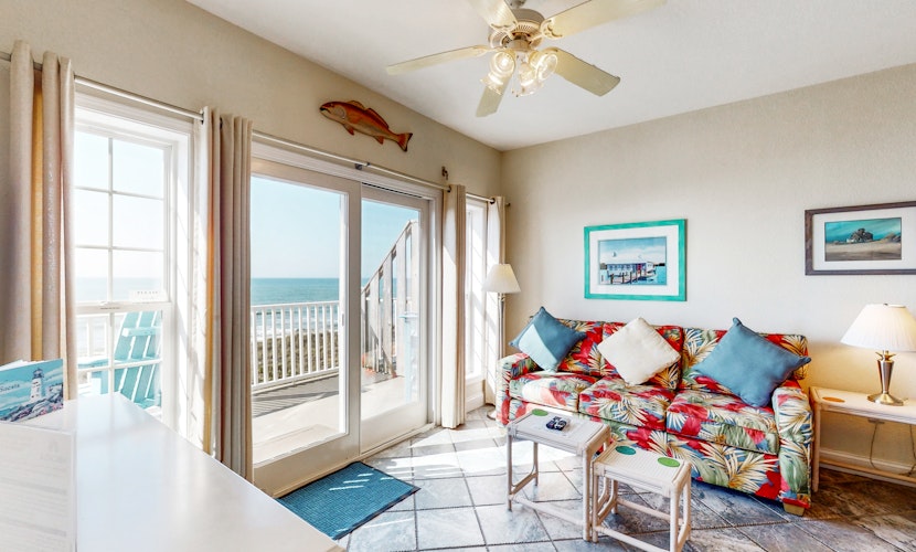 Sun-kissed beachfront condo with central AC, pool/hot tub access