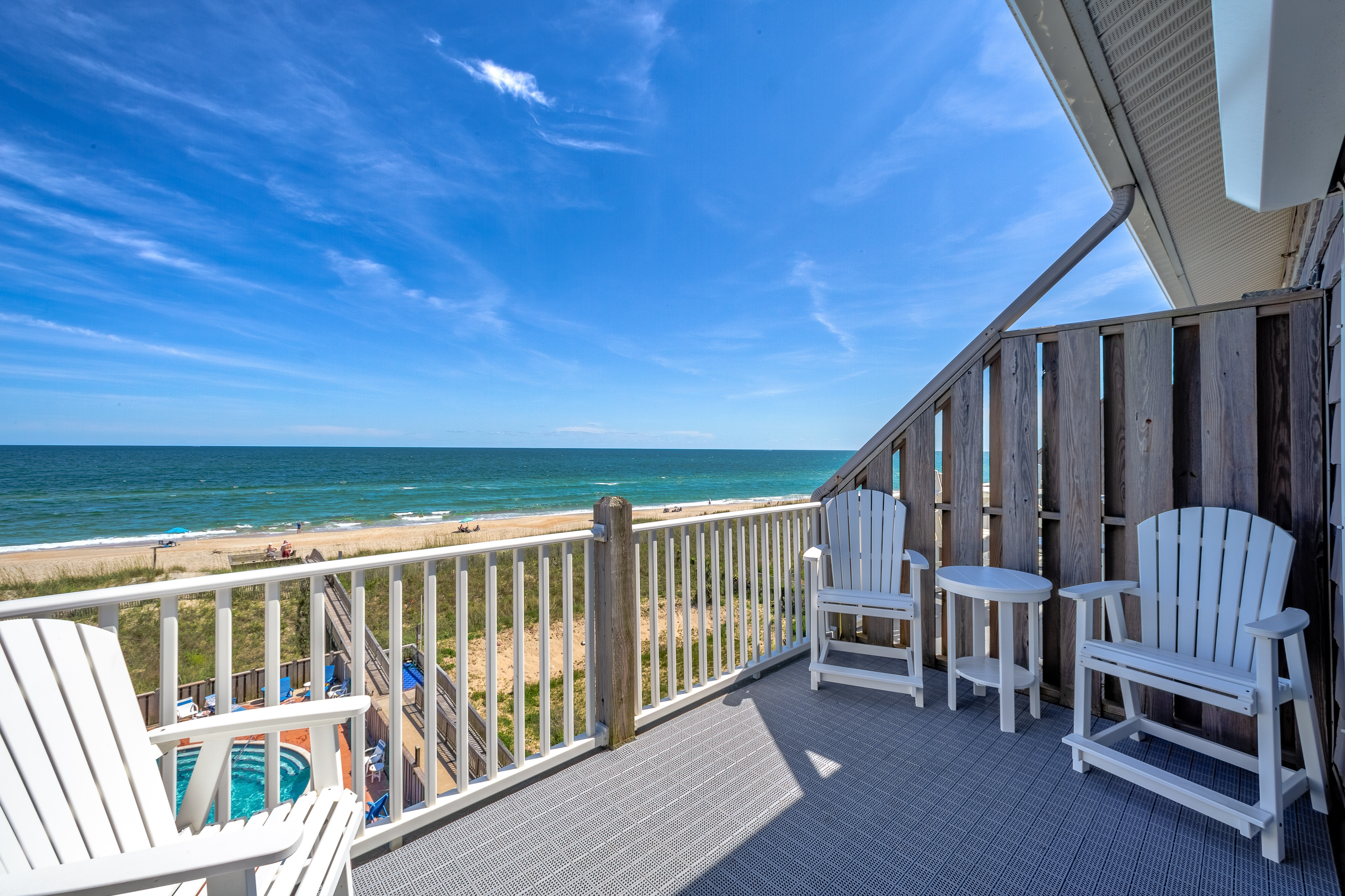 Oceanfront condo with outdoor pool, hot tub & pool table - near beach access