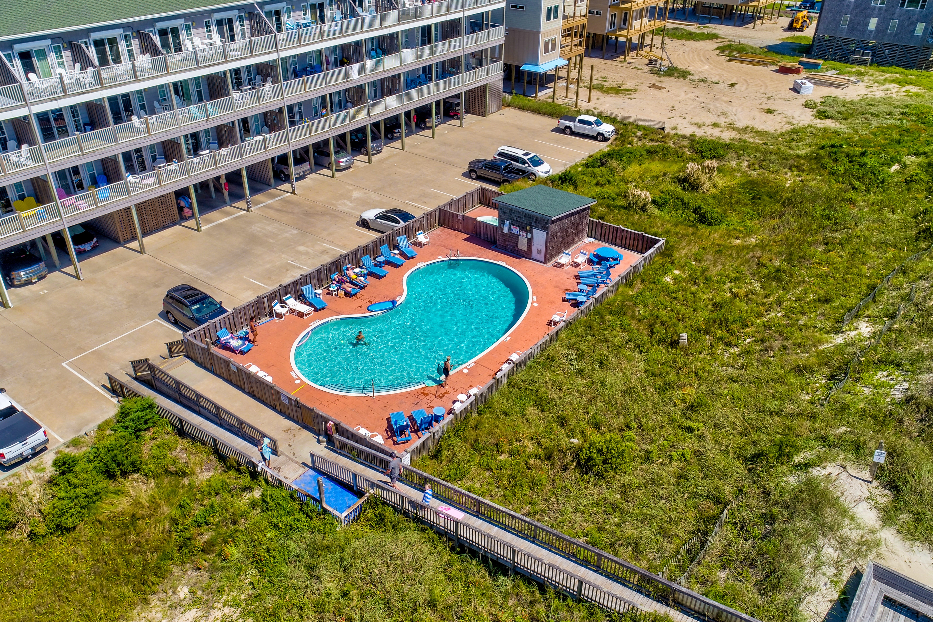Oceanfront condo with outdoor pool, hot tub & pool table - near beach access