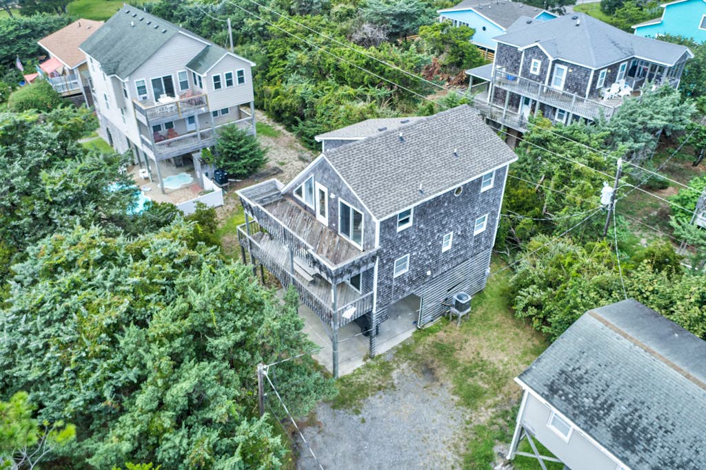 Ocean-view home with amazing sunset vista, pool access, steps to beach boardwalk