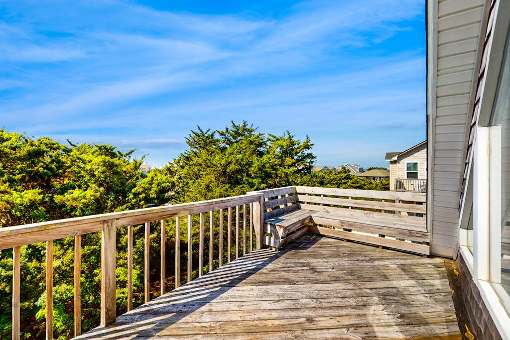 Ocean-view home with amazing sunset vista, pool access, steps to beach boardwalk