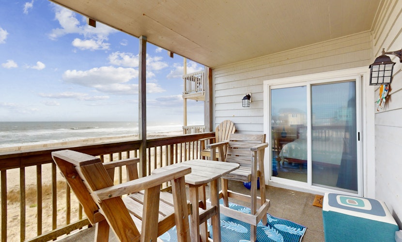 Oceanfront condo with outdoor pool, W/D BBQ, and balcony