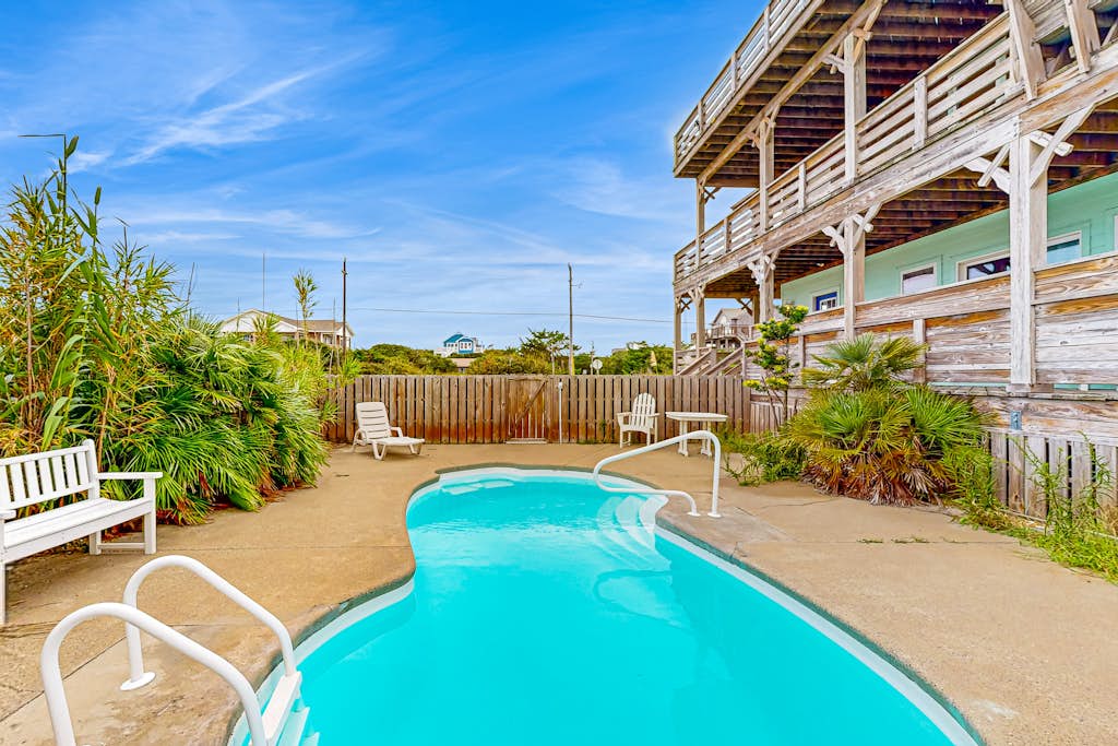 Towering beach house with private pool, hot tub, decks & ocean views