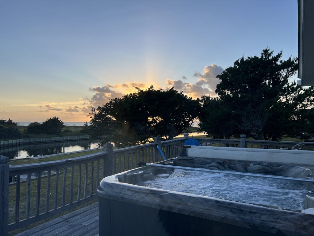 Waterfront house w/water views, private hot tub, theater room, game room/bar, AC