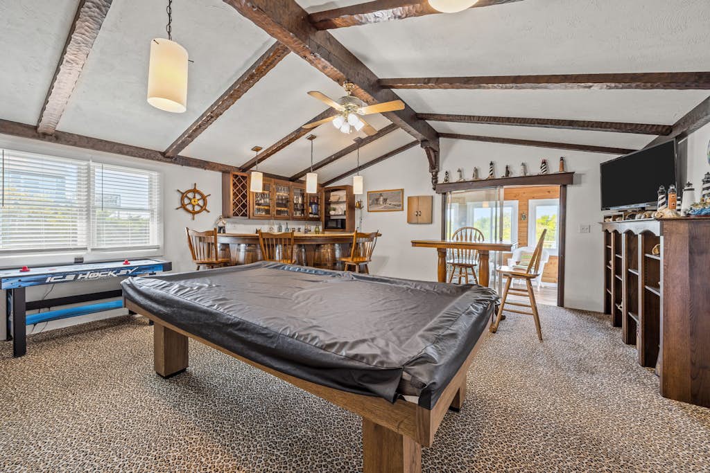 Waterfront house w/water views, private hot tub, theater room, game room/bar, AC