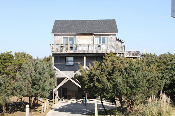Fun home with ocean view, washer/dryer, outdoor pool access, and private hot tub