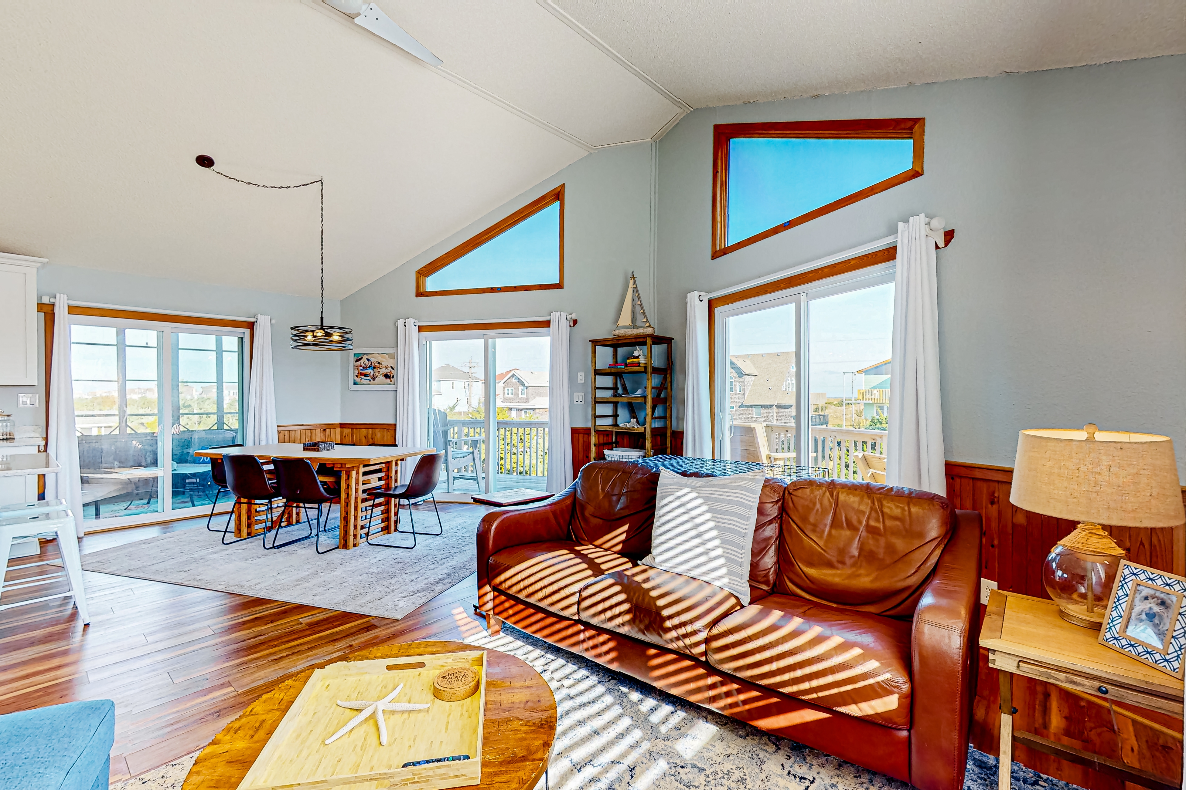 Home across from the beach with grill, pool access, & decks - dog-friendly