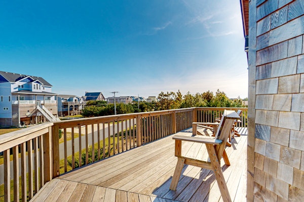 Home across from the beach with grill, pool access, & decks - dog-friendly