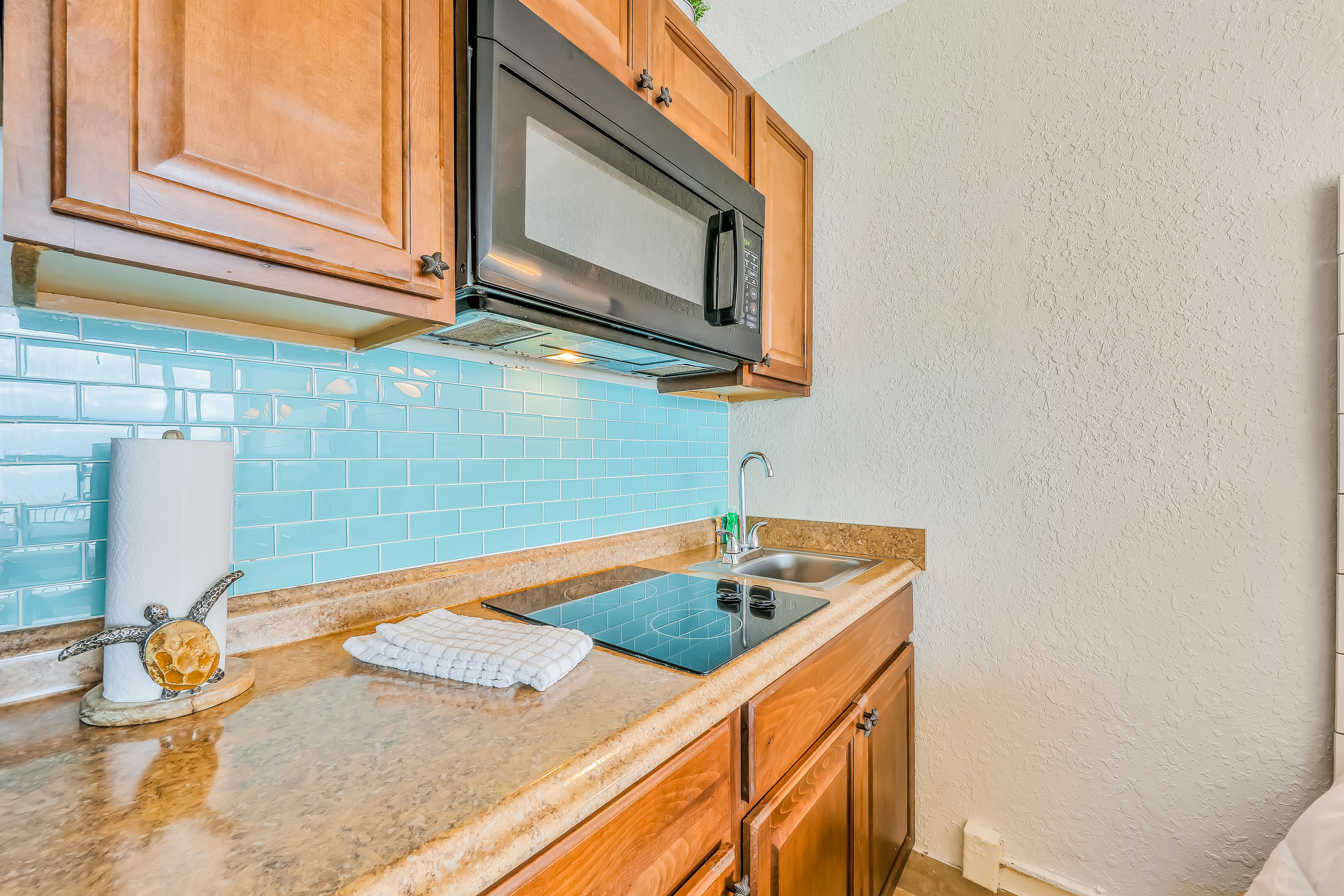 Beachfront Serenity with Balcony, Walk to Dining & Attractions