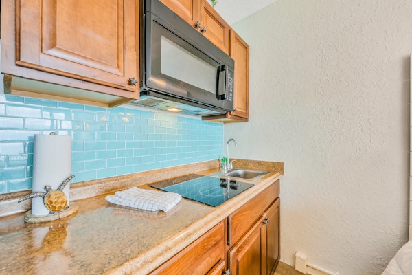 Beachfront Serenity with Balcony, Walk to Dining & Attractions