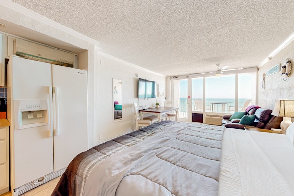 Romantic Oceanfront Studio with Balcony & Direct Beach Access
