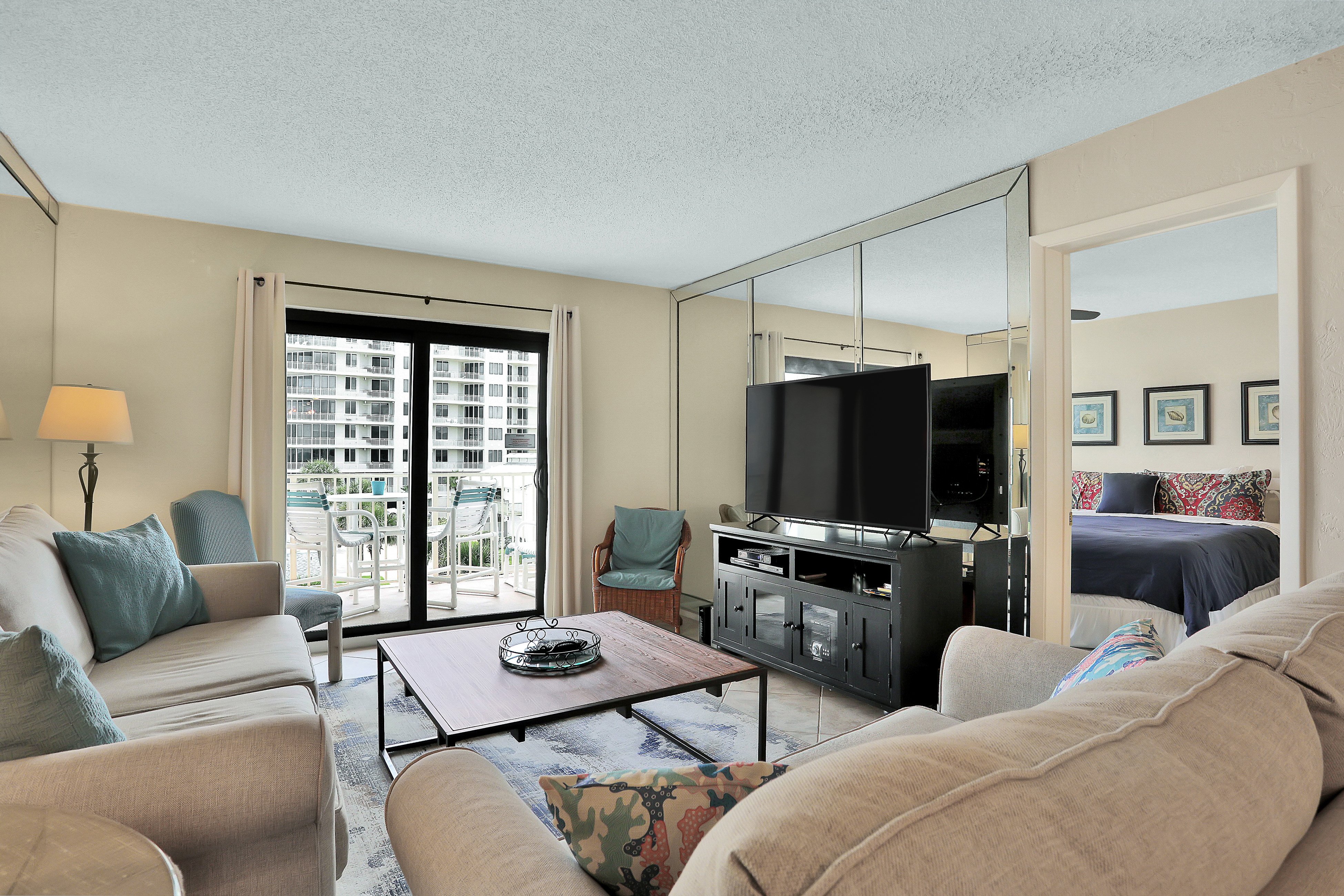 Oceanfront Relaxation with Balcony, Pool & Steps to Dining