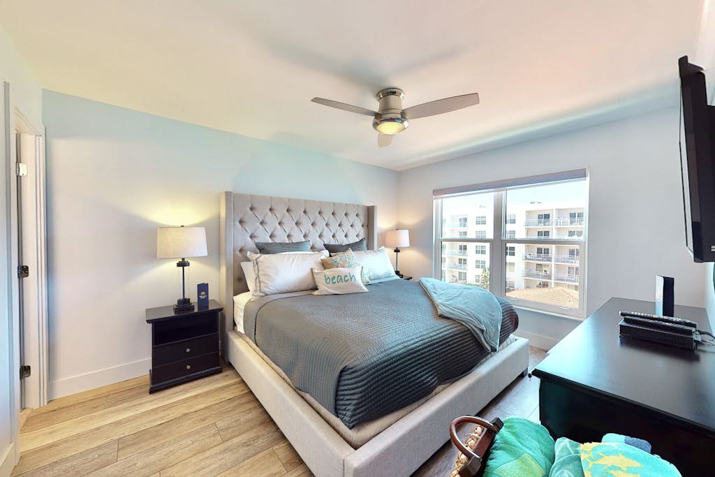 Modern Coastal Condo w/ Balcony, Pool & Easy Walk to the Beach