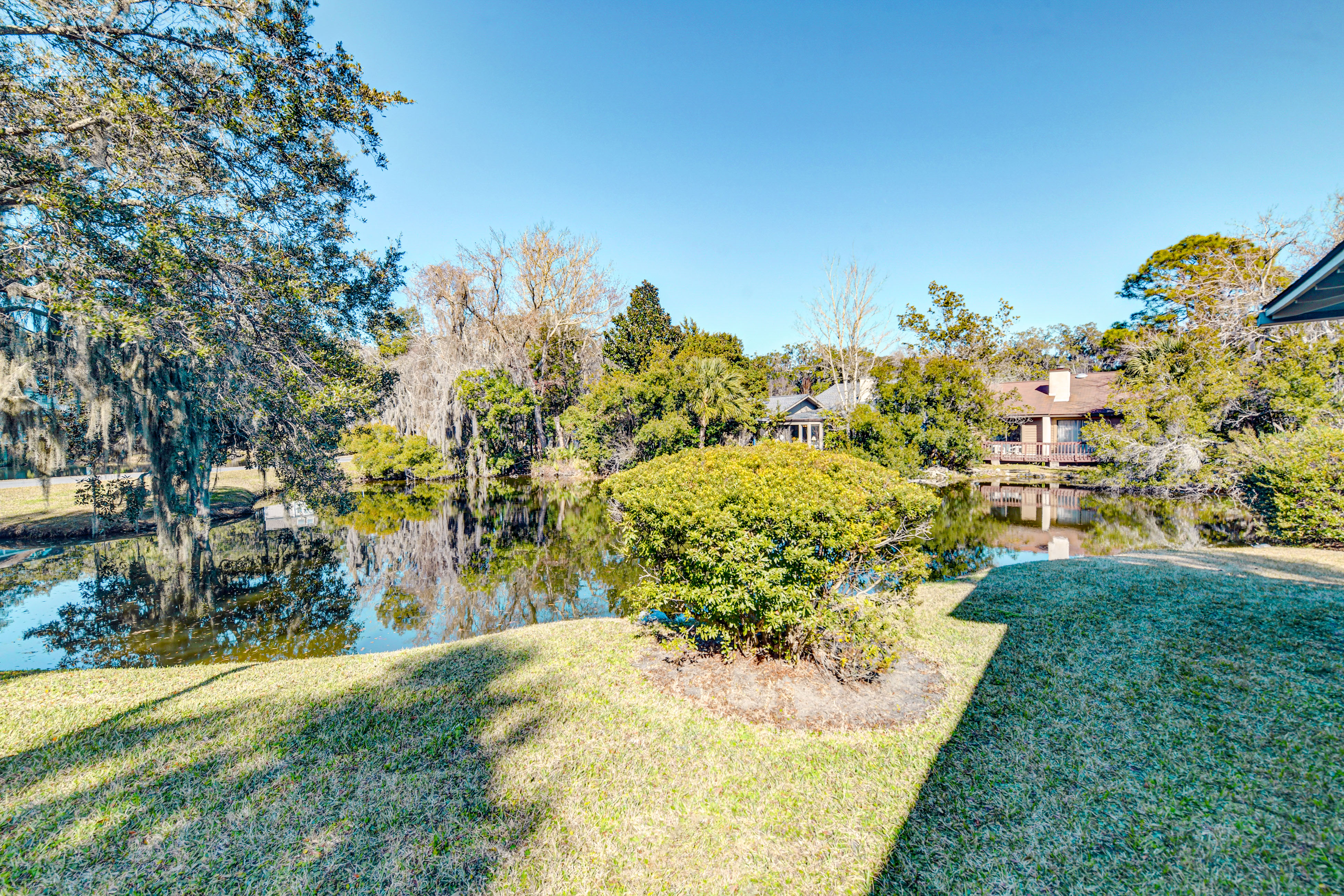 Sleek golf-front condo with a washer/dryer, deck, & central AC - dog friendly
