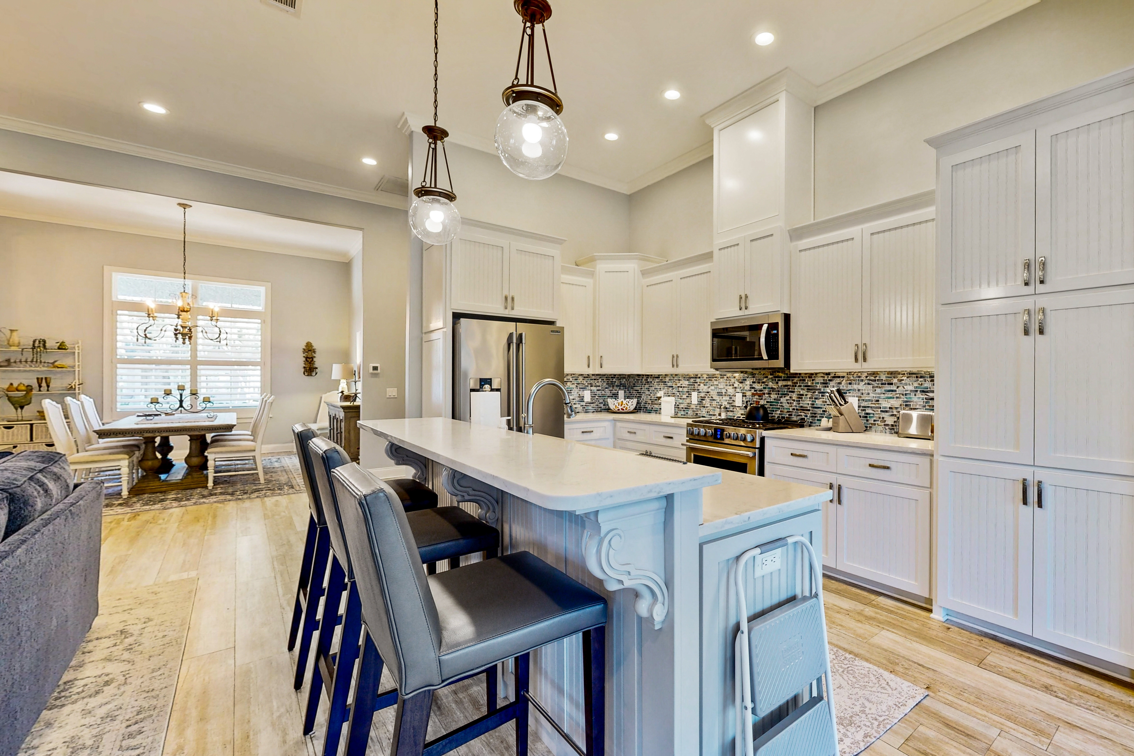 Golf course-view home near beaches with deck, porch, grill, streaming, W/D, & AC