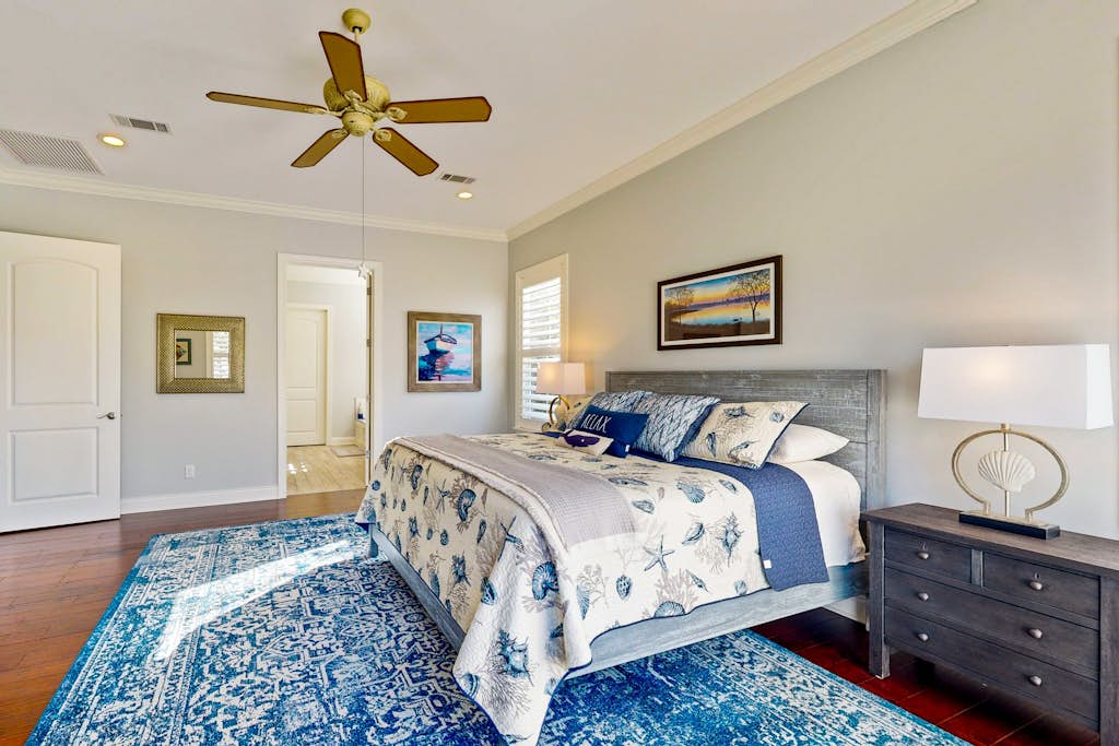 Golf course-view home near beaches with deck, porch, grill, streaming, W/D, & AC
