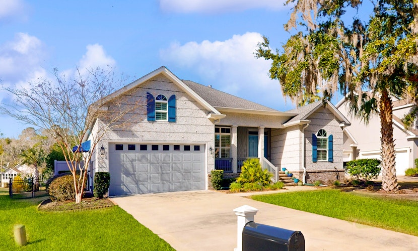 Golf course-view home near beaches with deck, porch, grill, streaming, W/D, & AC