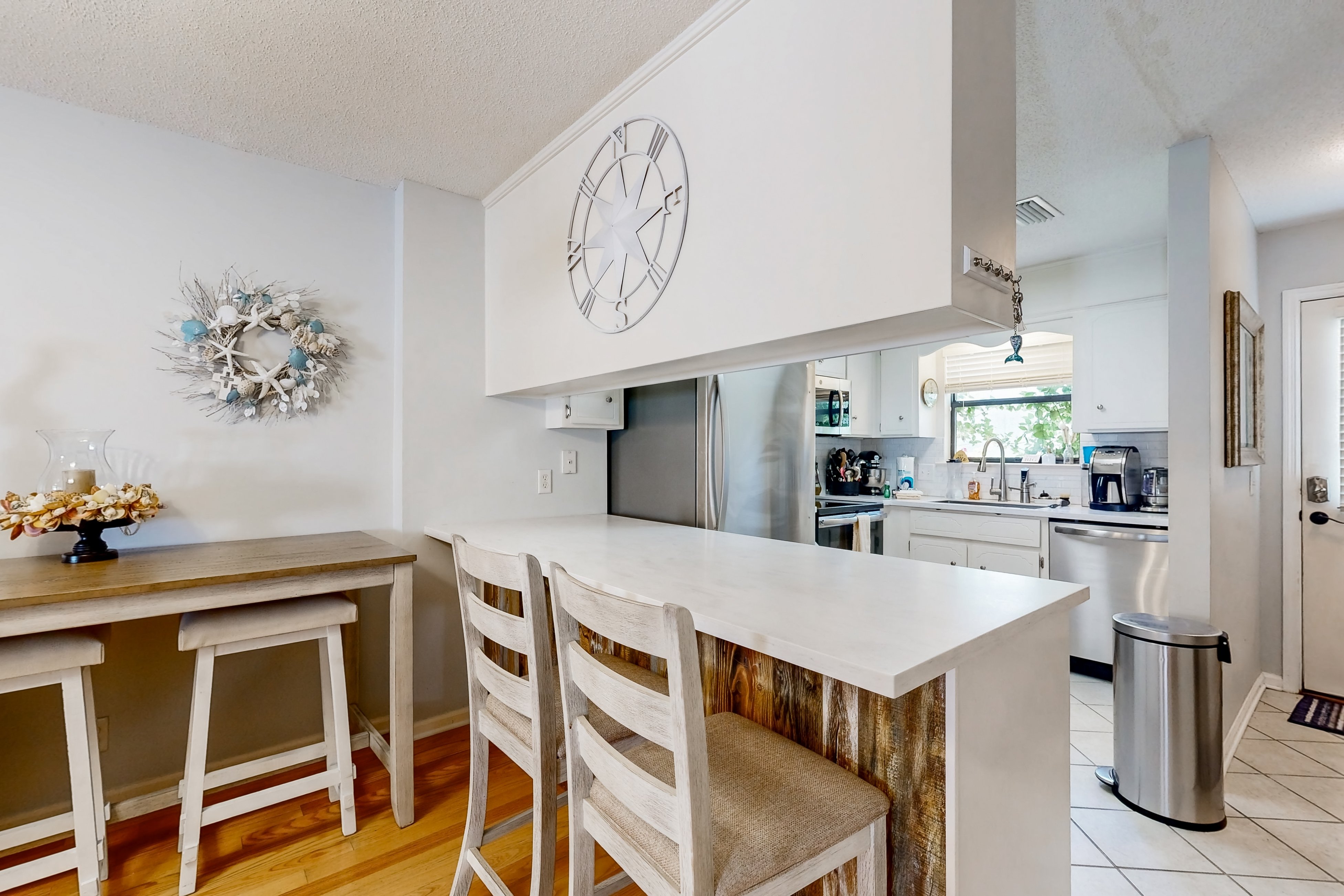 Inviting condo with an outdoor pool, washer/dryer, & AC - near the beach