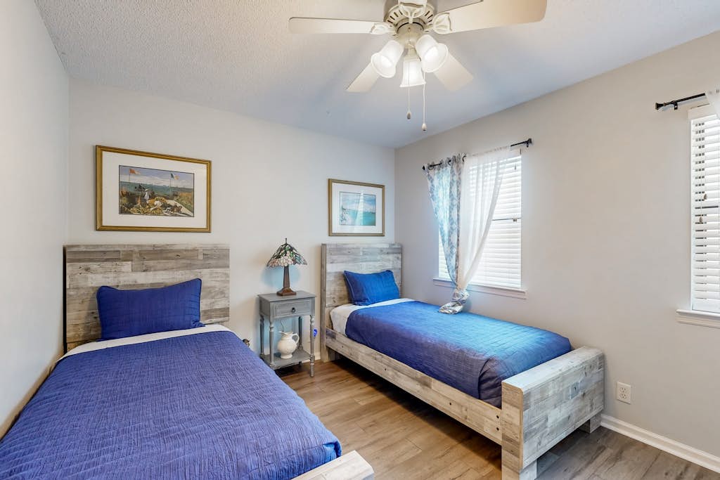 Inviting condo with an outdoor pool, washer/dryer, & AC - near the beach