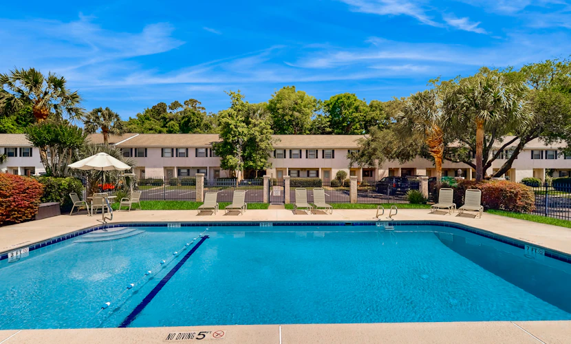 Inviting condo with an outdoor pool, washer/dryer, & AC - near the beach
