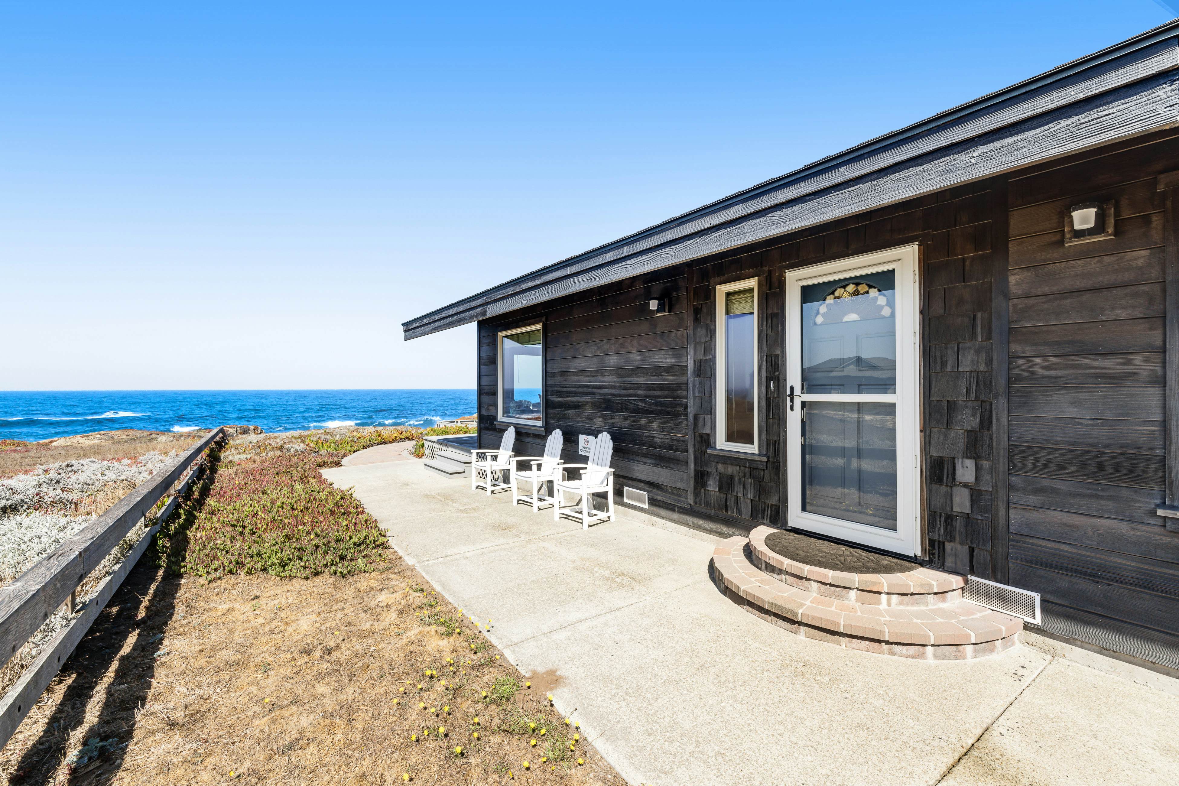 Waterfront Home: Panoramic Views & Private Cove