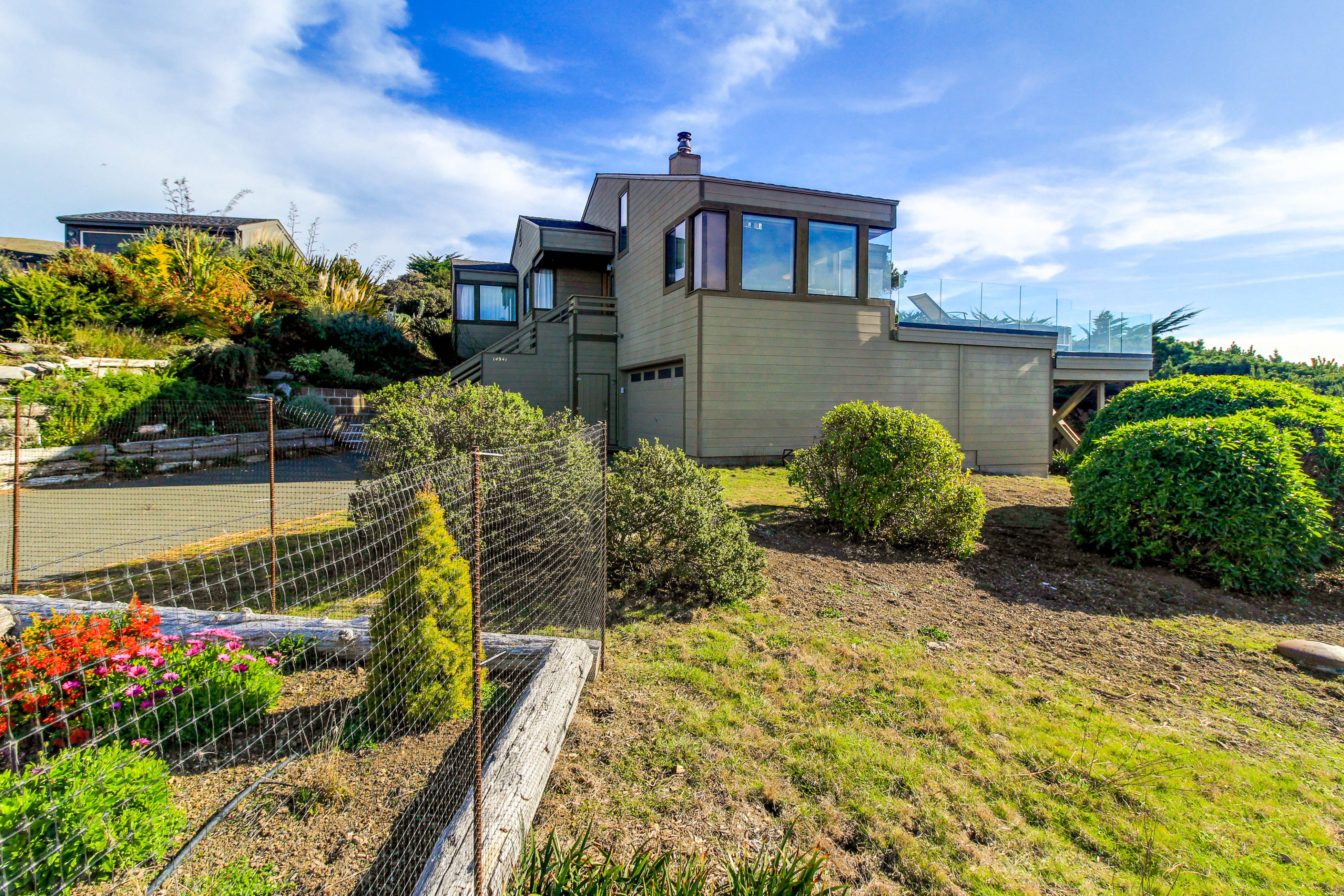 Stunning ocean view home with hot tub and deck