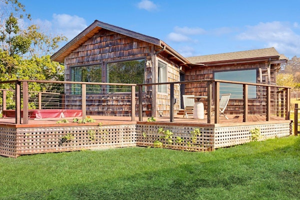 Oceanfront cottage with beach views & deck