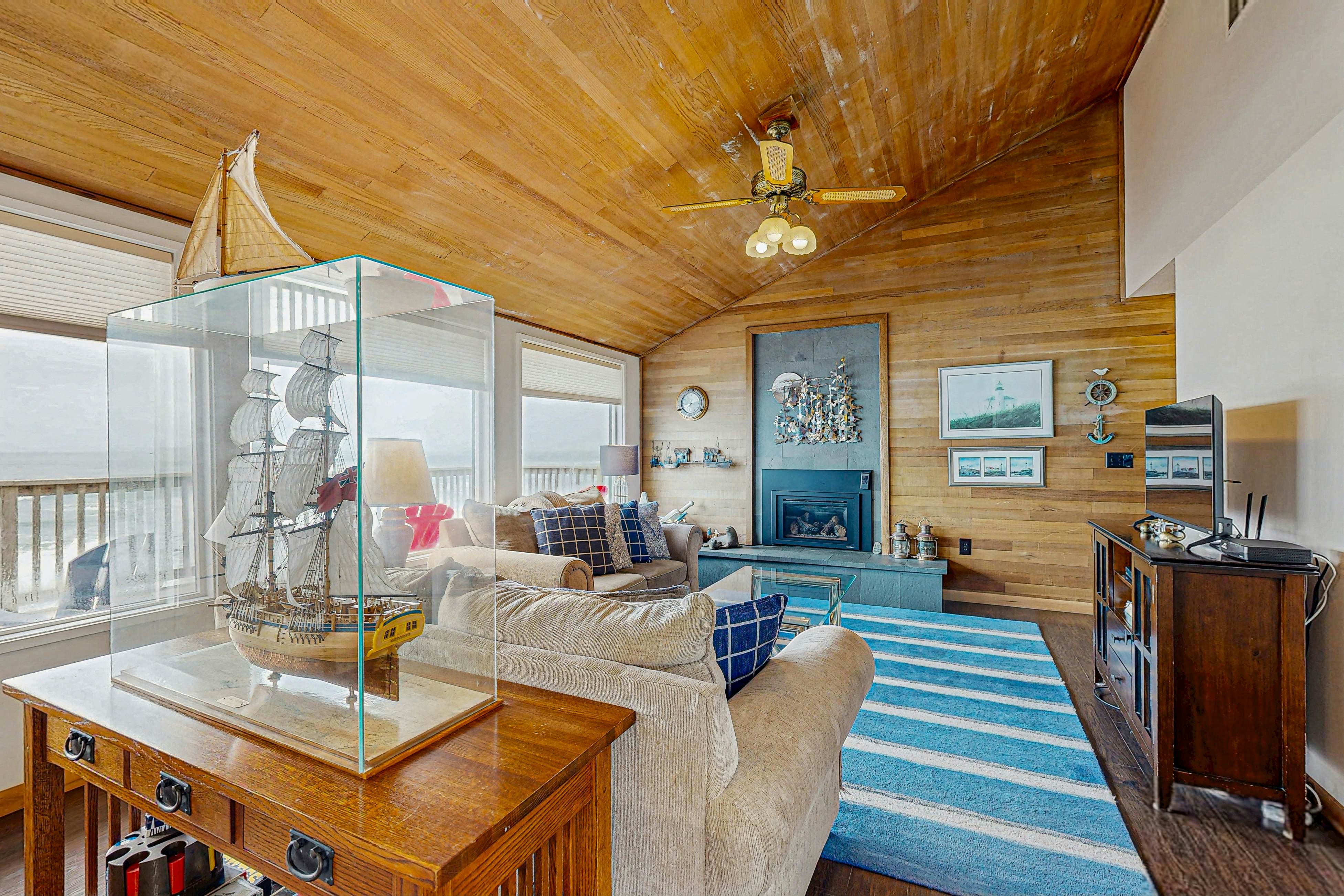 Dog-friendly home with oceanfront location & fireplace - walk to the beach