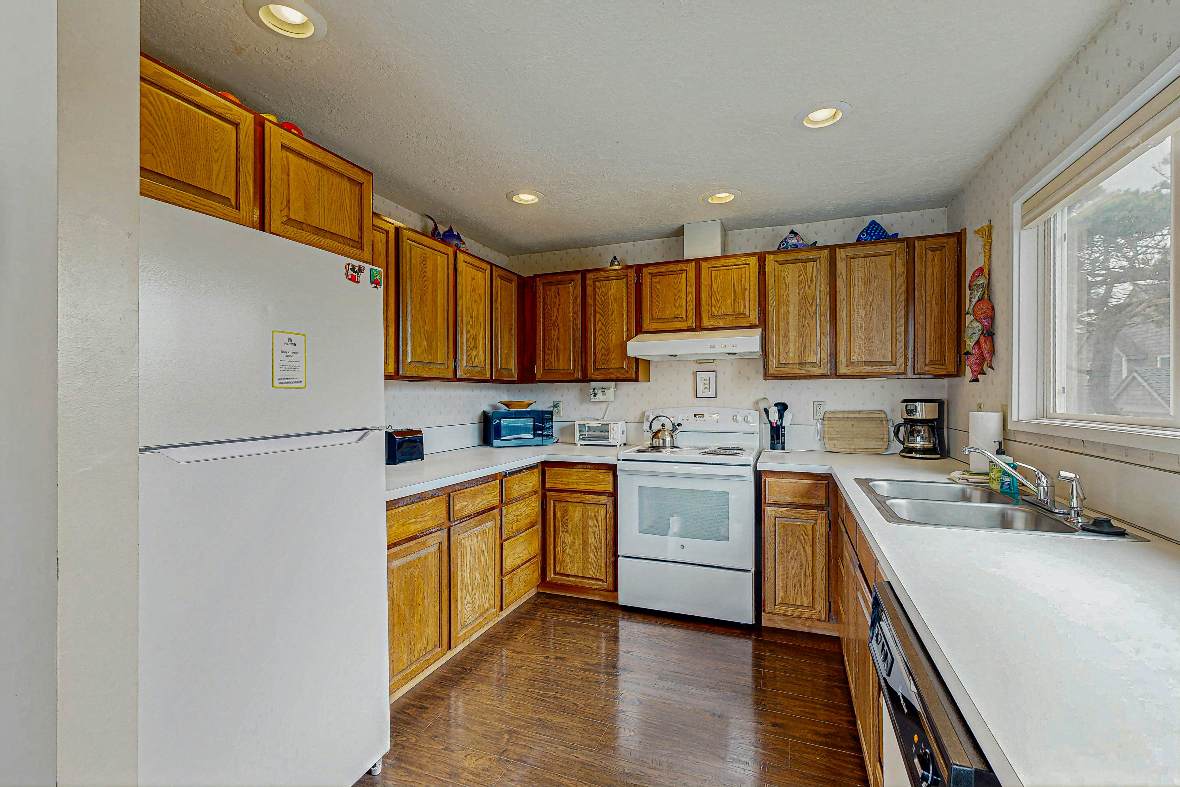 Dog-friendly home with oceanfront location & fireplace - walk to the beach