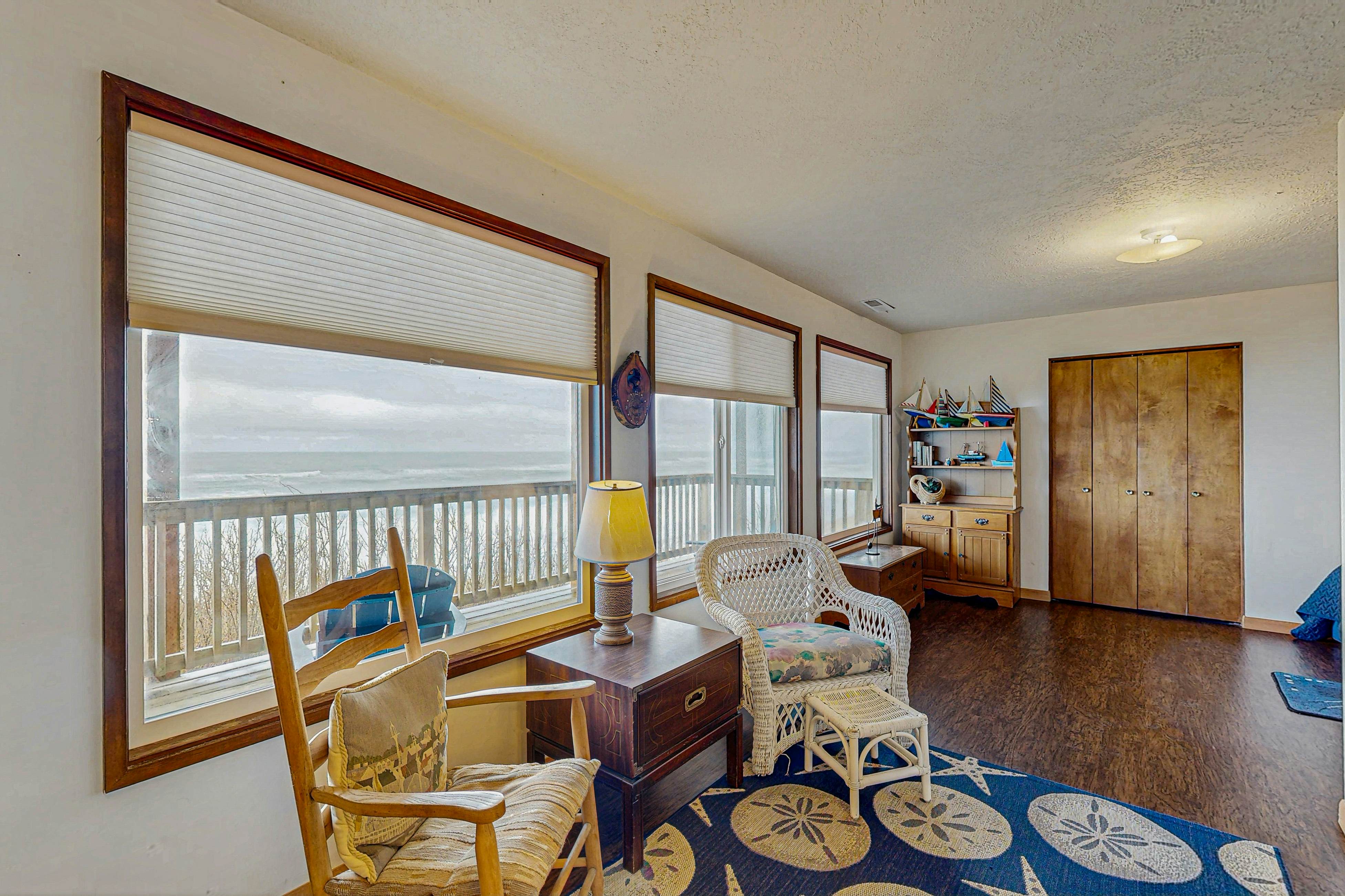 Dog-friendly home with oceanfront location & fireplace - walk to the beach