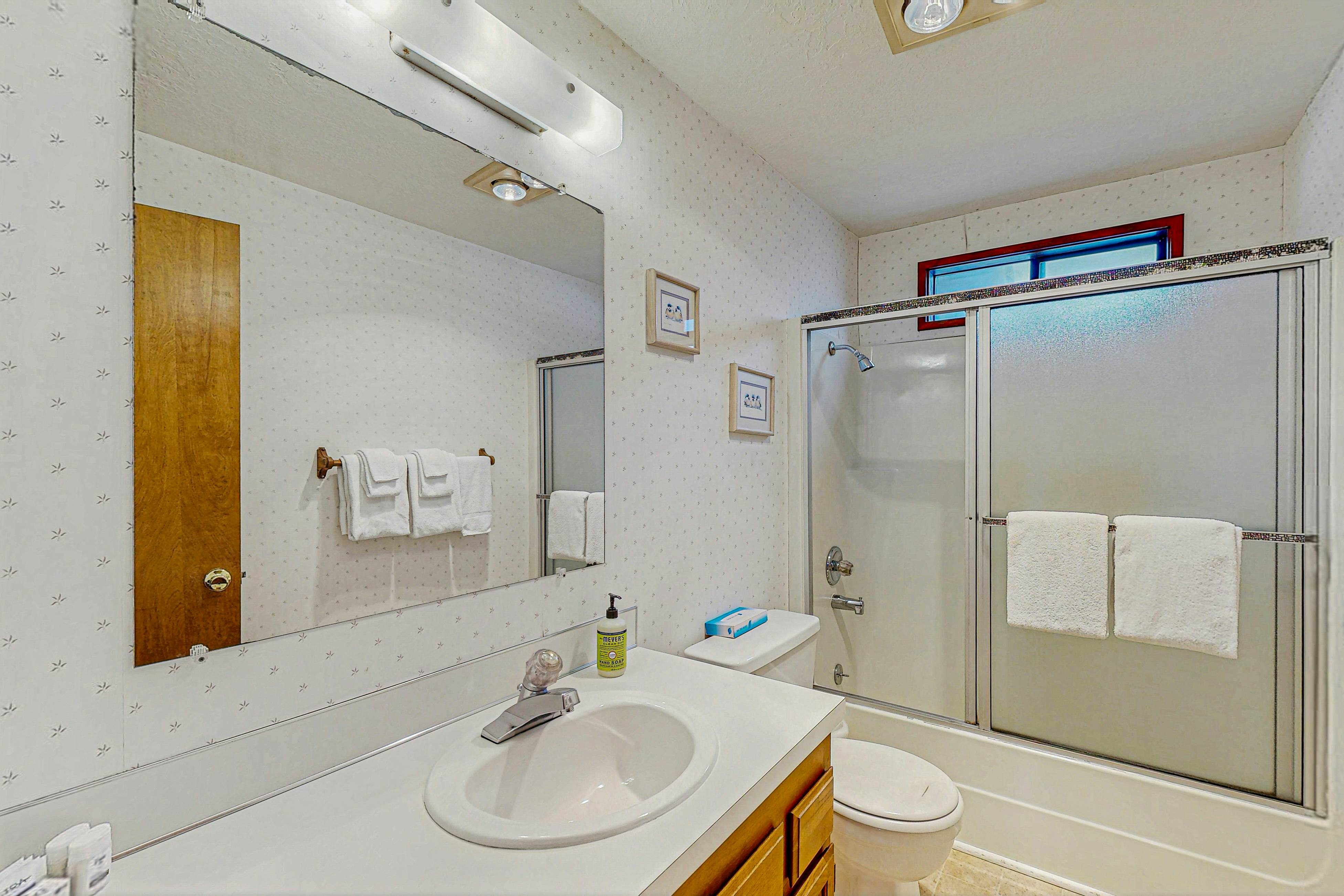 Dog-friendly home with oceanfront location & fireplace - walk to the beach