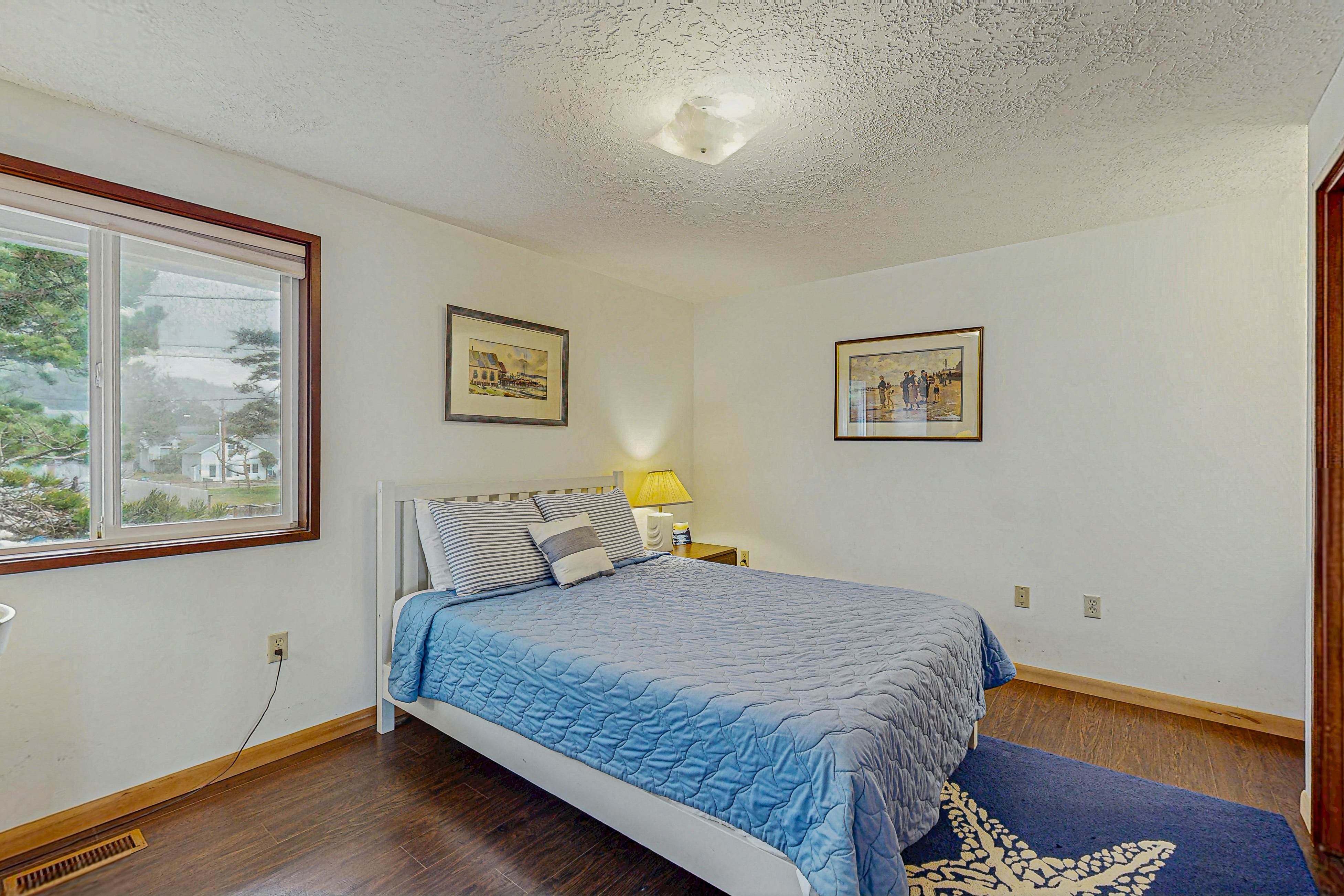 Dog-friendly home with oceanfront location & fireplace - walk to the beach