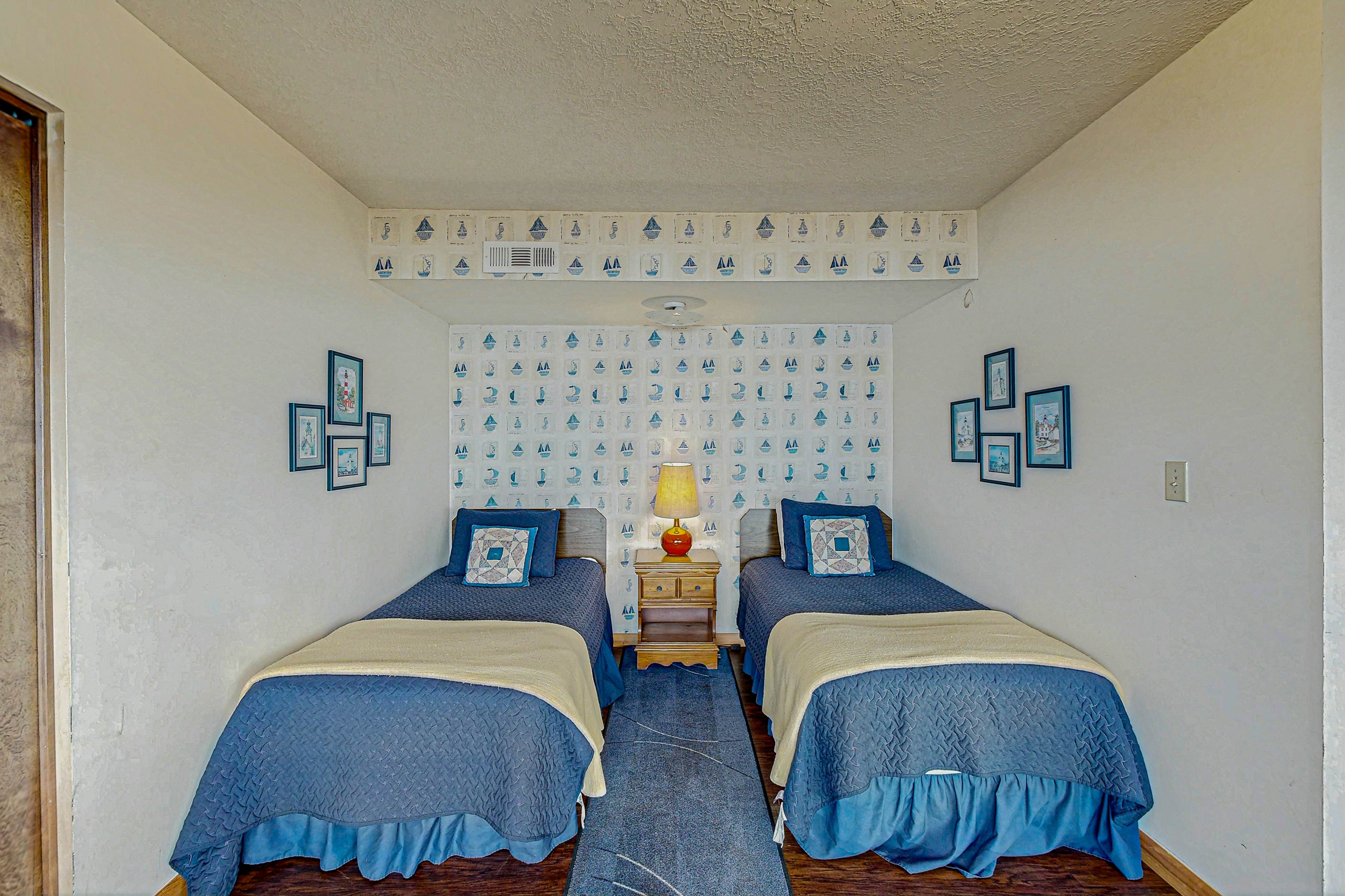 Dog-friendly home with oceanfront location & fireplace - walk to the beach