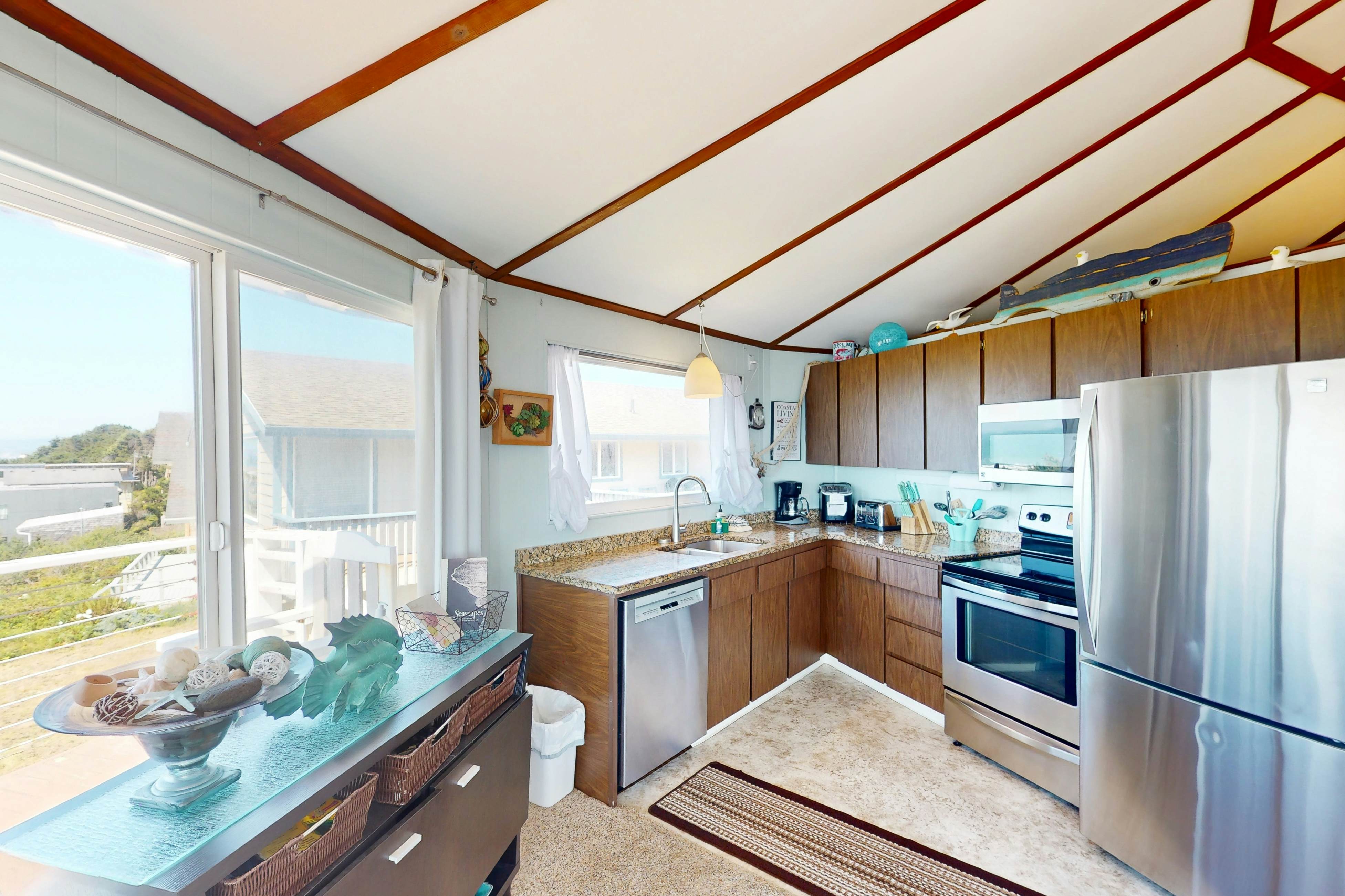 Dog-friendly home with great decks & stunning ocean views