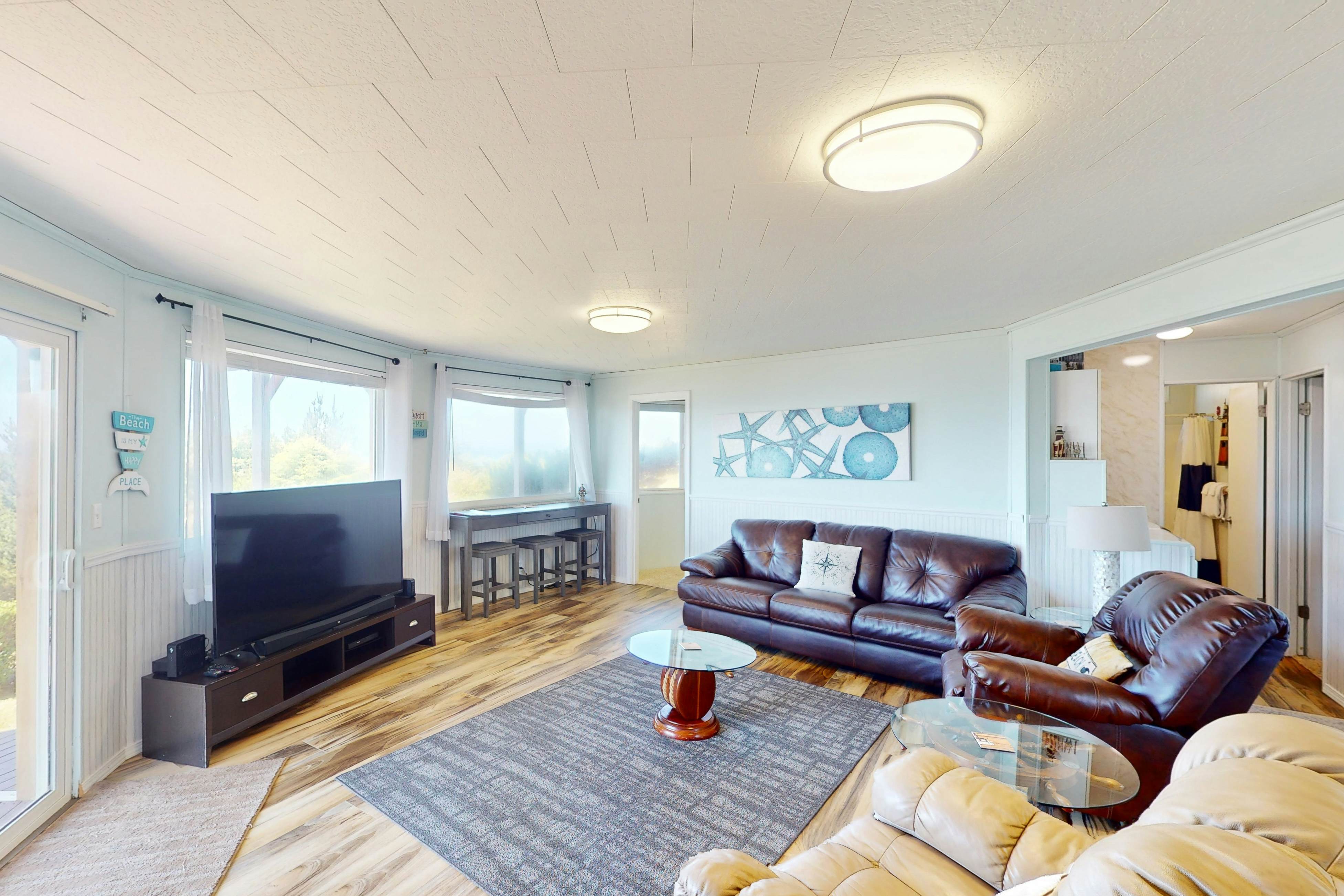 Dog-friendly home with great decks & stunning ocean views