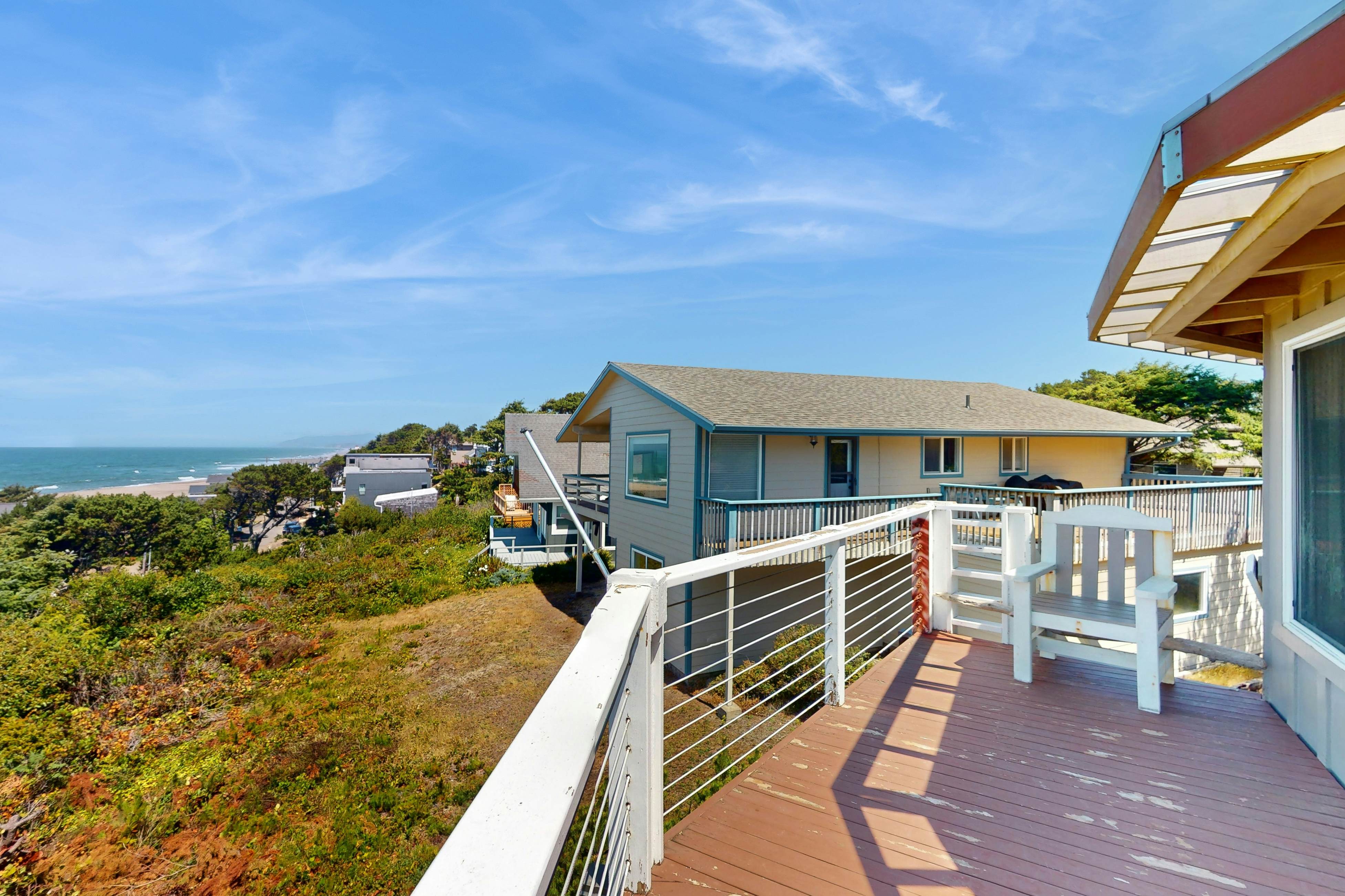 Dog-friendly home with great decks & stunning ocean views