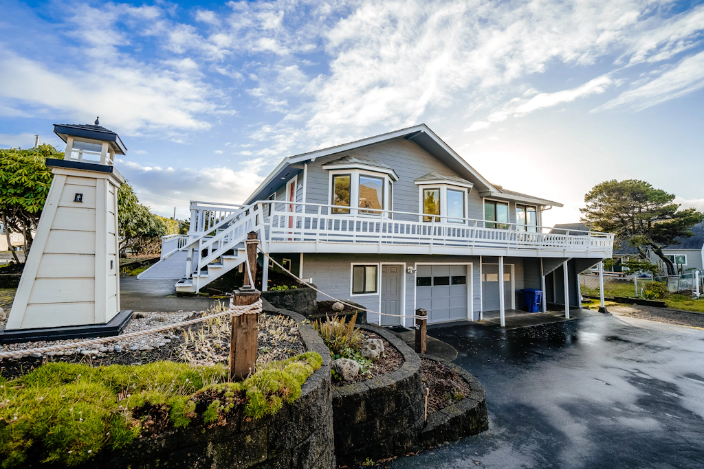 Homey dog friendly house with partial ocean views gas fireplaces and gas grill