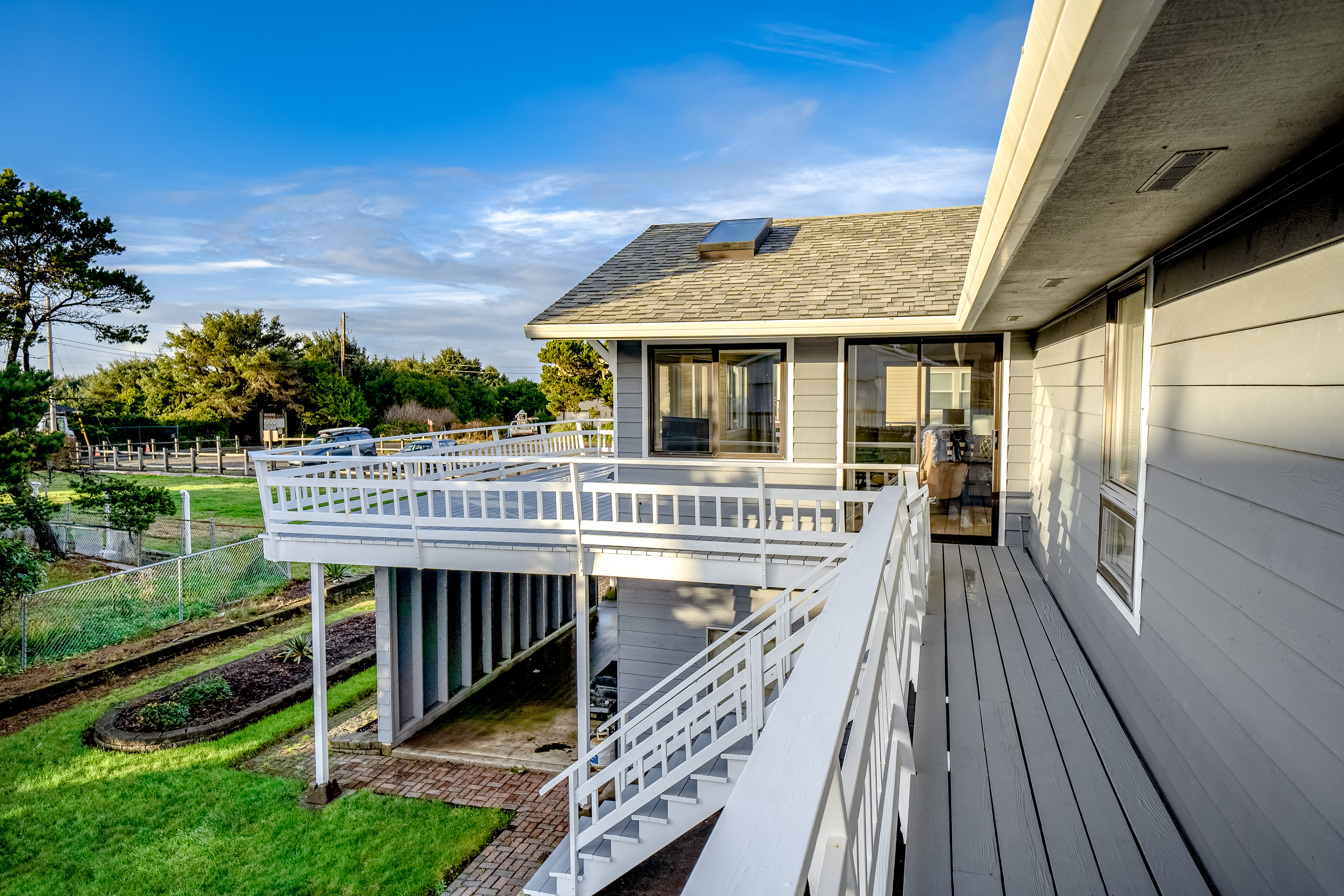 Homey dog friendly house with partial ocean views gas fireplaces and gas grill