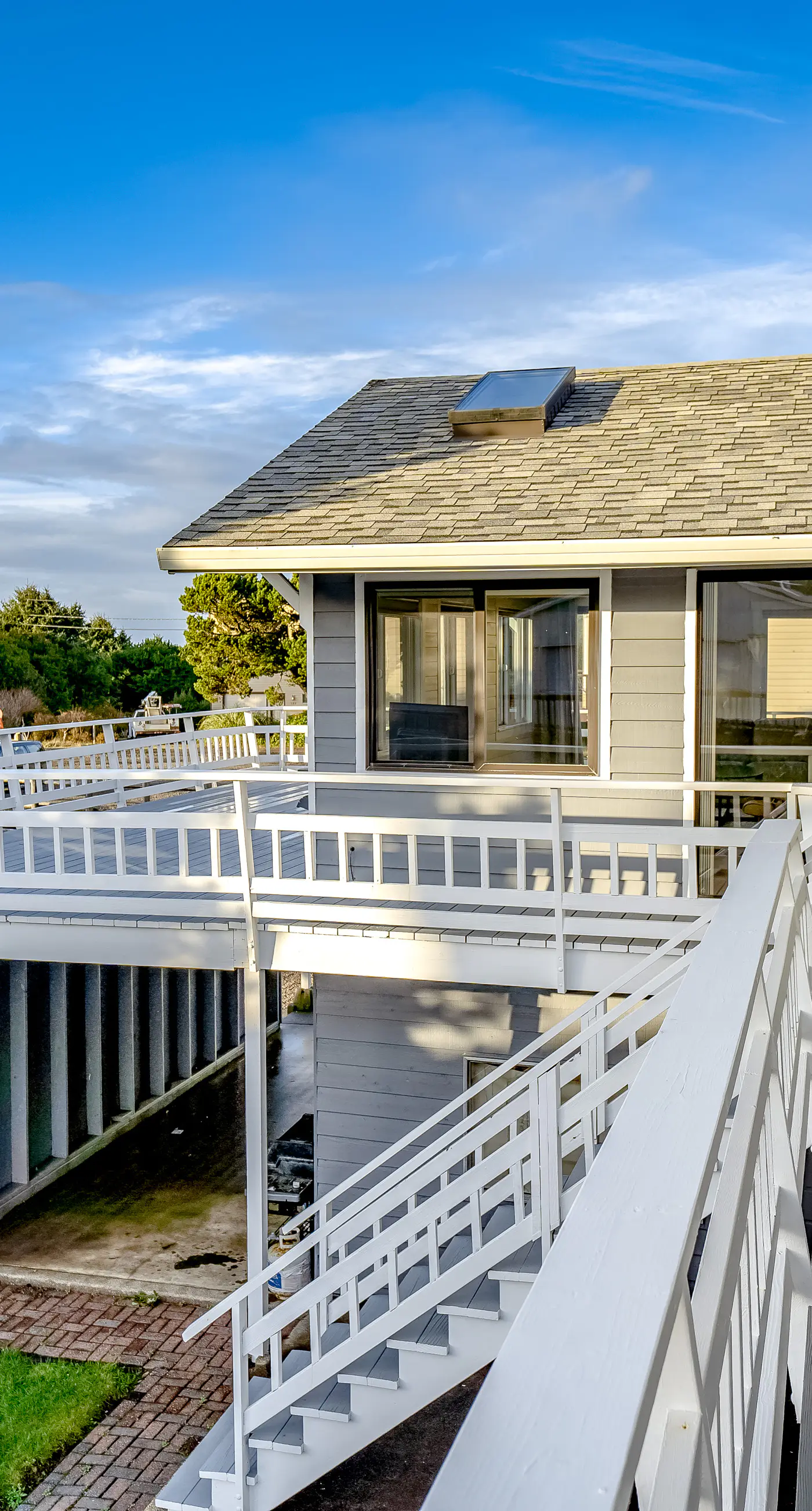 Homey dog friendly house with partial ocean views gas fireplaces and gas grill