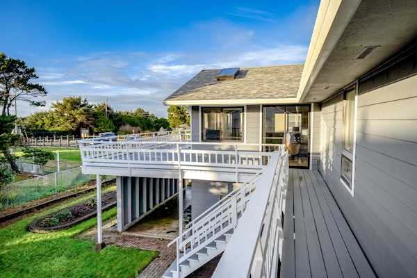 Homey dog friendly house with partial ocean views gas fireplaces and gas grill