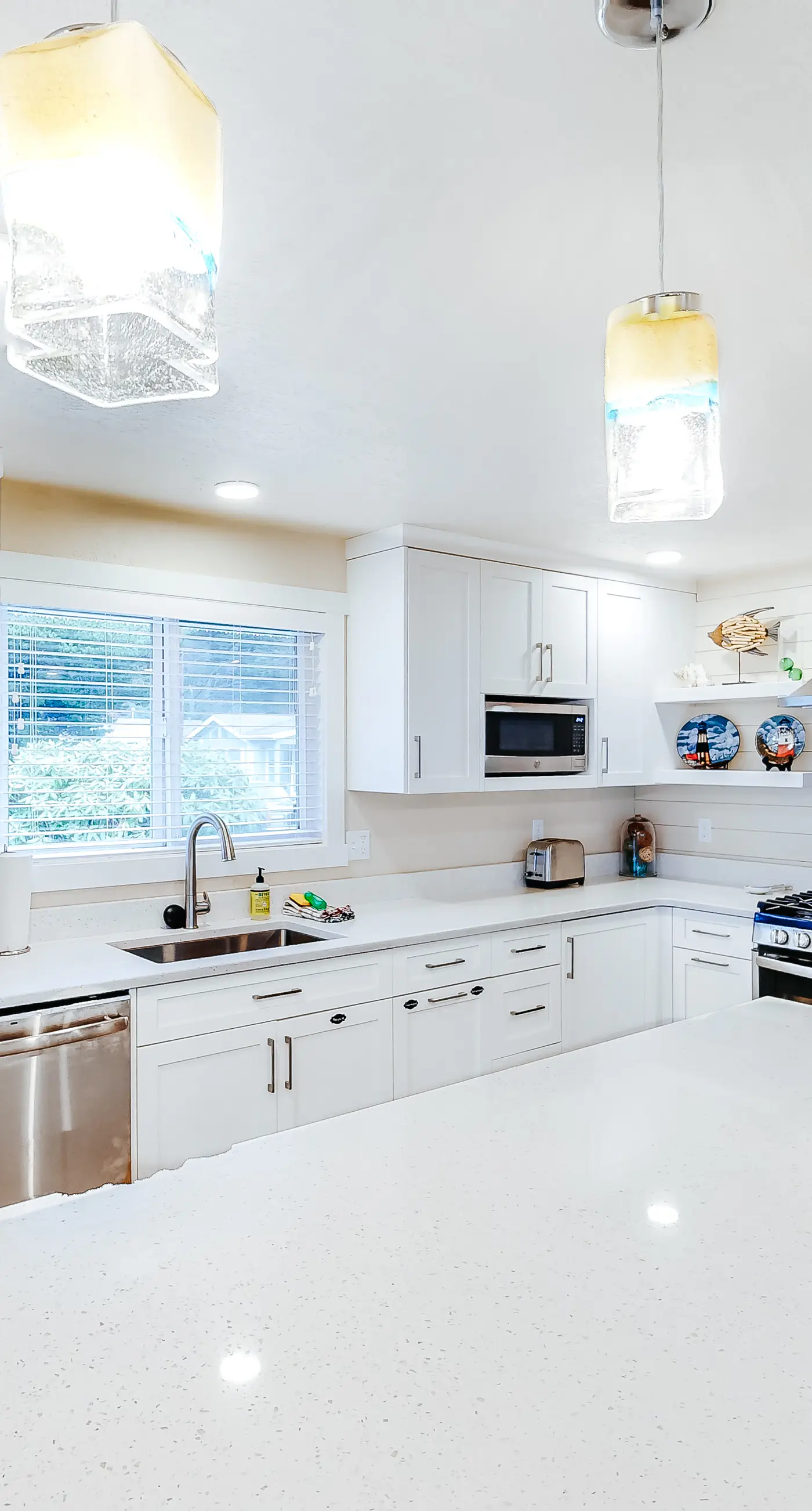 Homey dog friendly house with partial ocean views gas fireplaces and gas grill