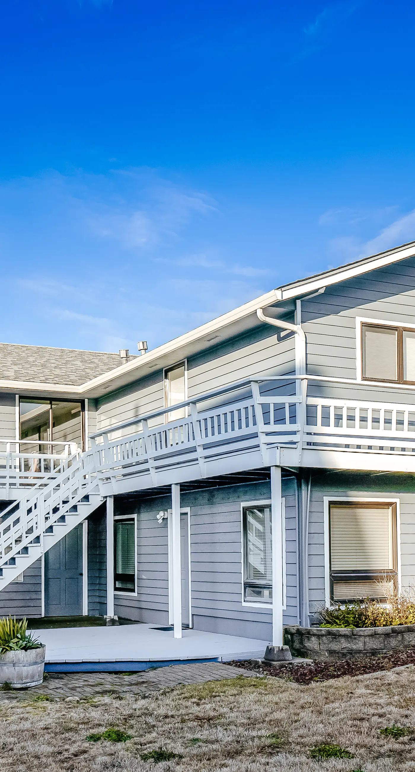 Homey dog friendly house with partial ocean views gas fireplaces and gas grill