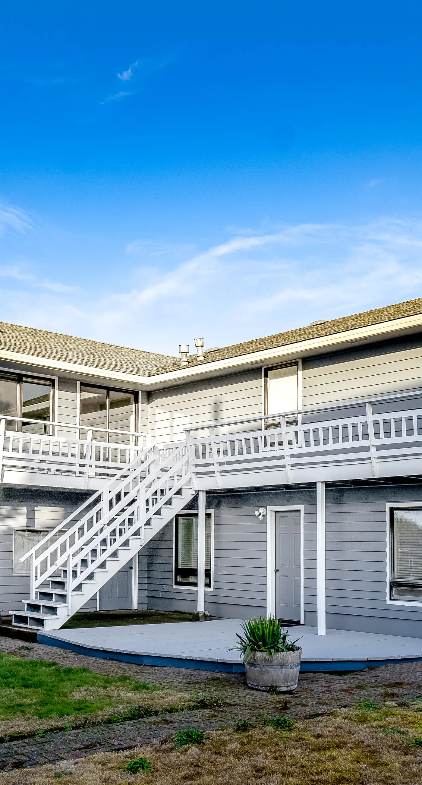 Homey dog friendly house with partial ocean views gas fireplaces and gas grill