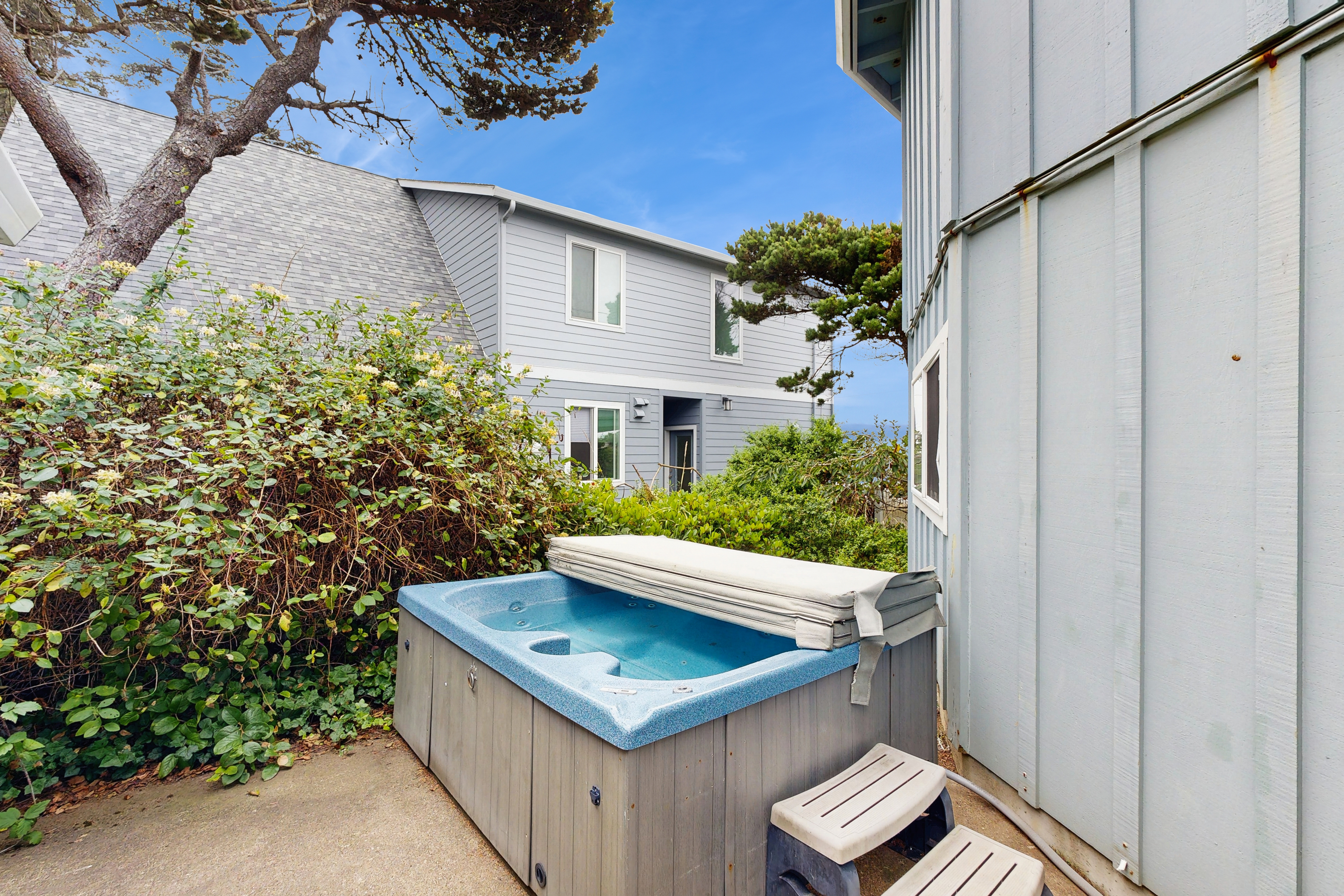 Unique and spacious home with private hot tub game room and great ocean views