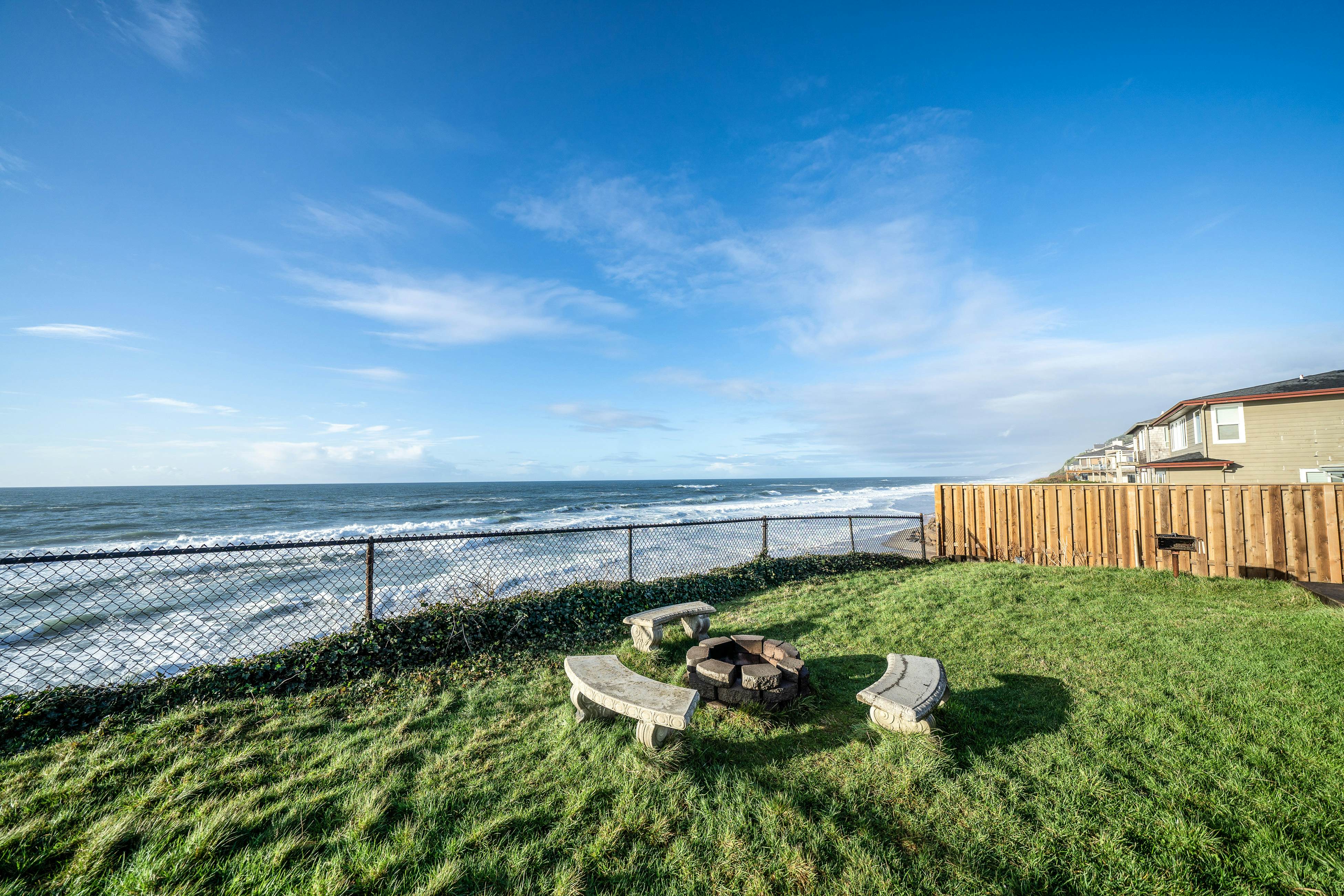 Oceanfront house steps to beach with private hot tub, firepit & spectacular view