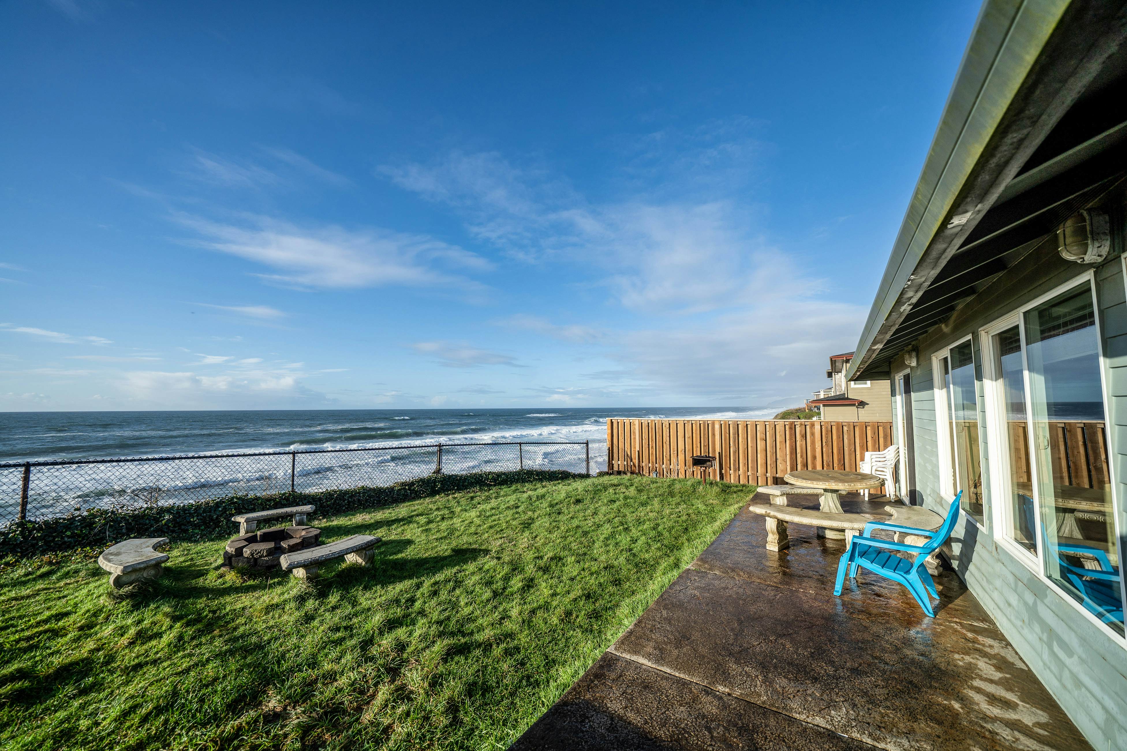 Oceanfront house steps to beach with private hot tub, firepit & spectacular view