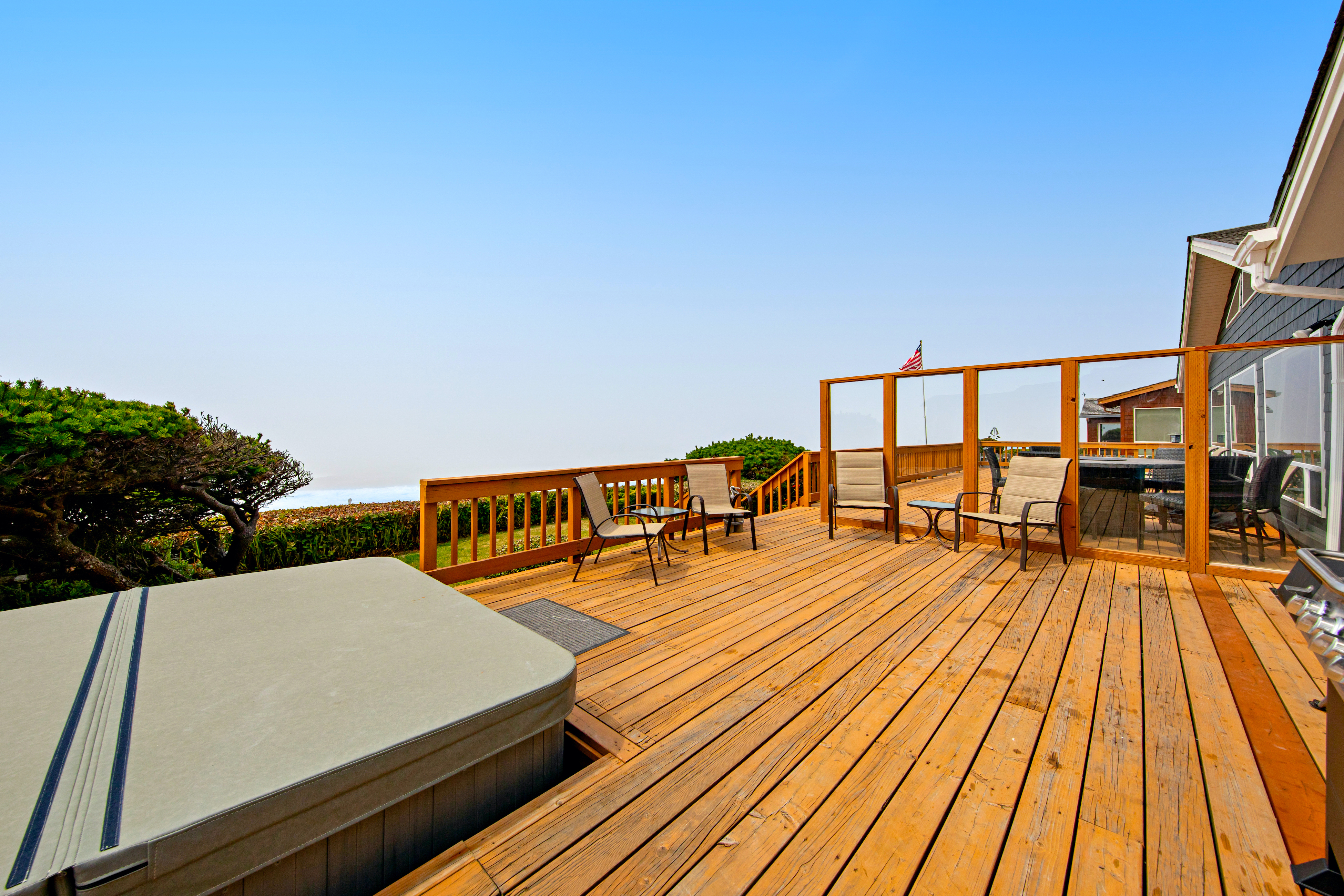 Oceanfront dog friendly house with deck private hot tub and stunning views