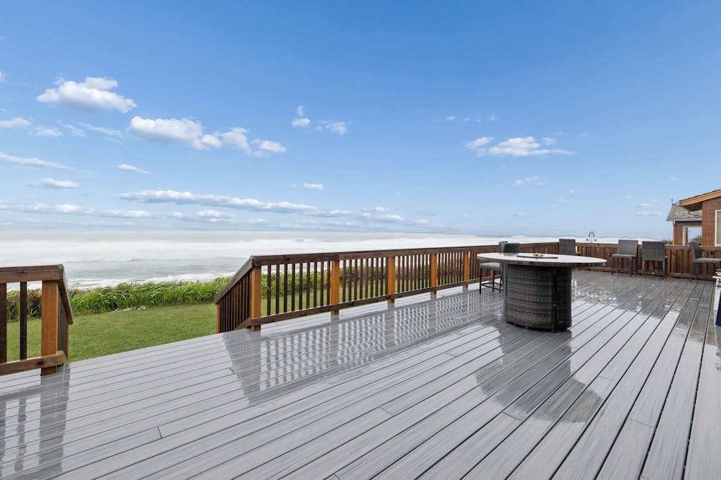 Oceanfront dog friendly house with deck private hot tub and stunning views