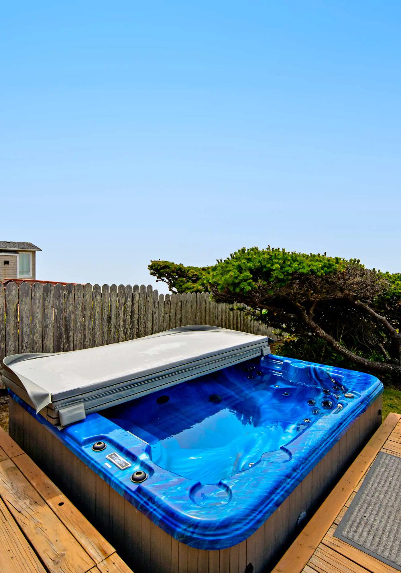 Oceanfront dog friendly house with deck private hot tub and stunning views