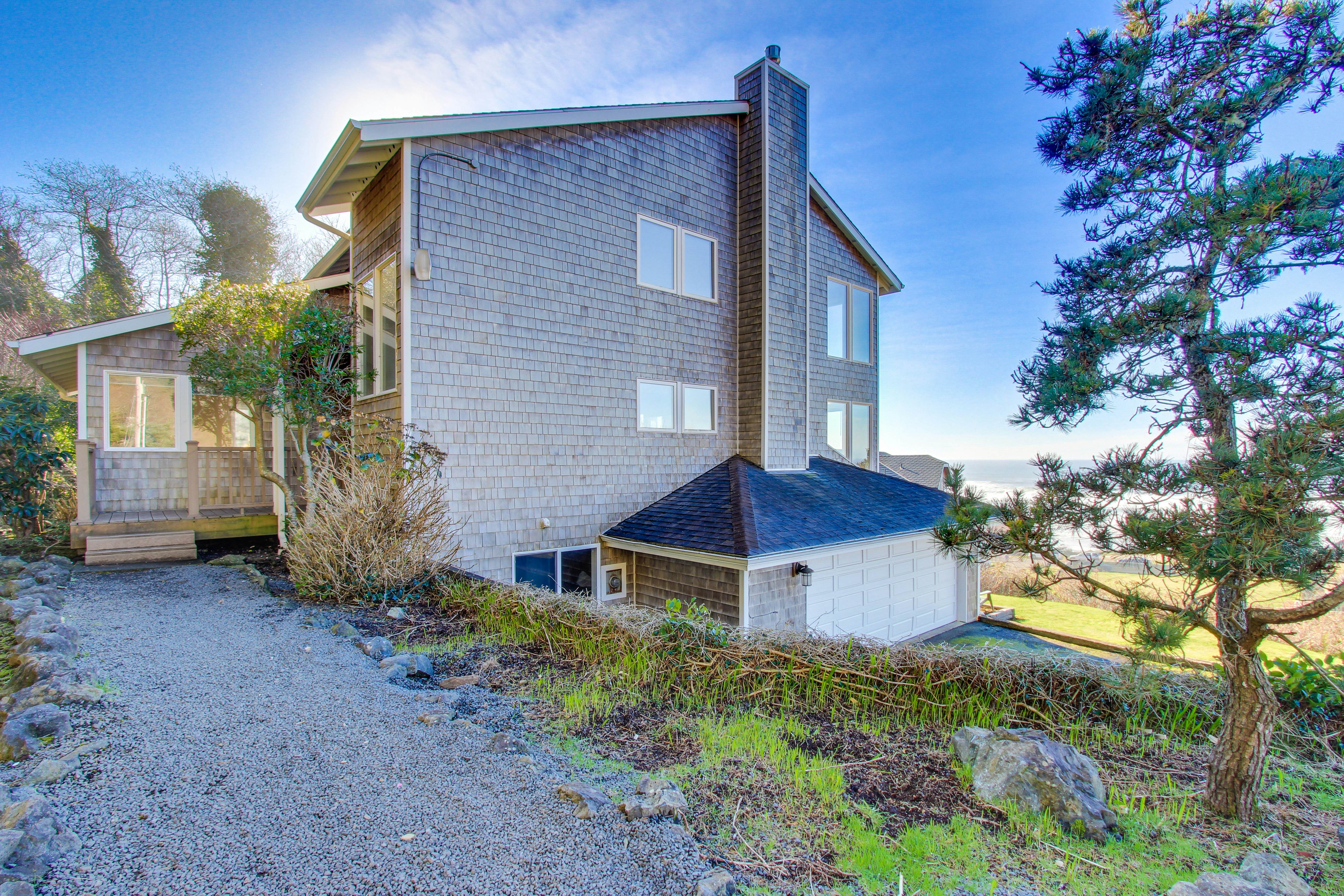Sunlit home with gorgeous ocean views big decks and hot tub